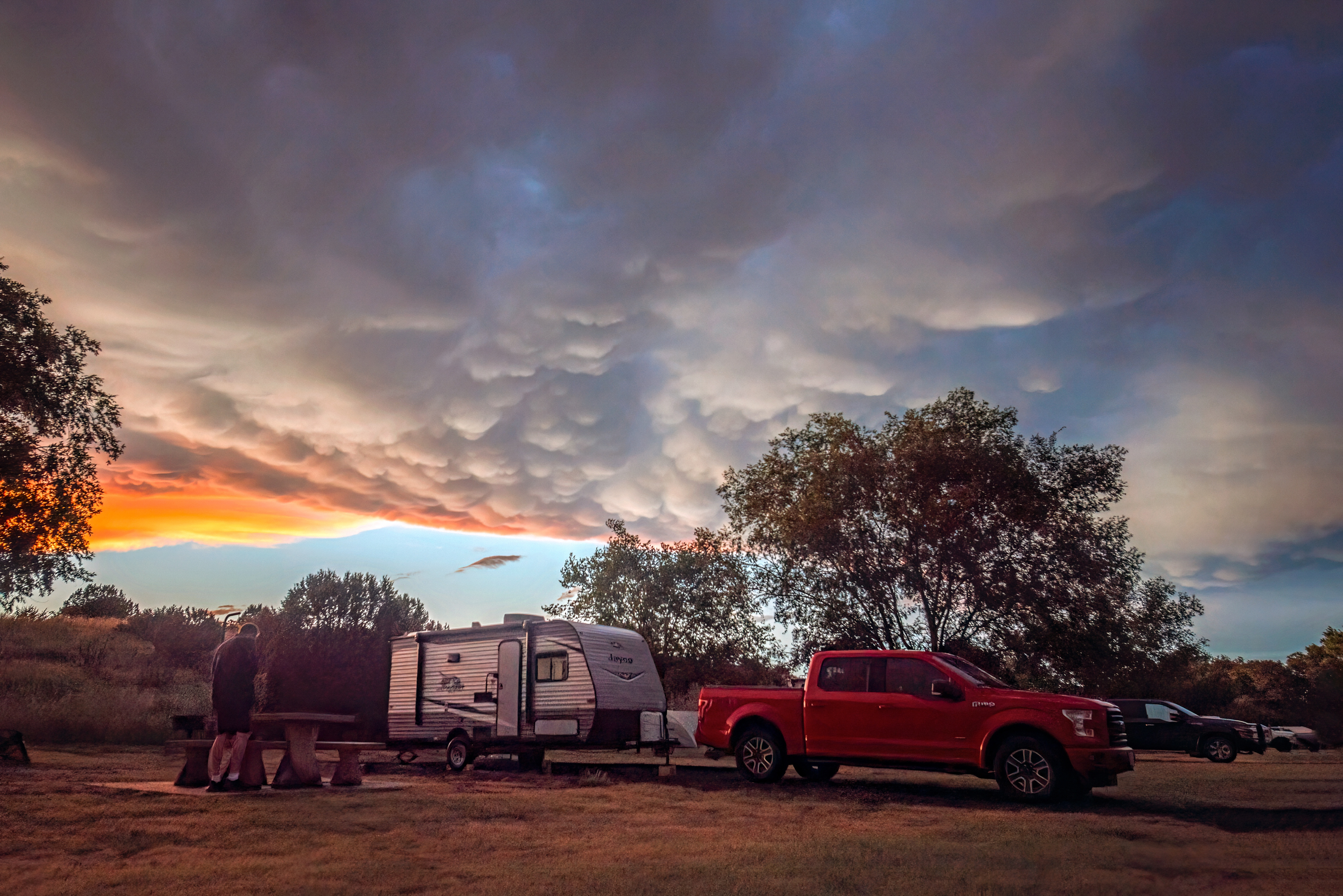The Alison and Jason Takacs family's Jayco Jay Flight at a campground during sunset