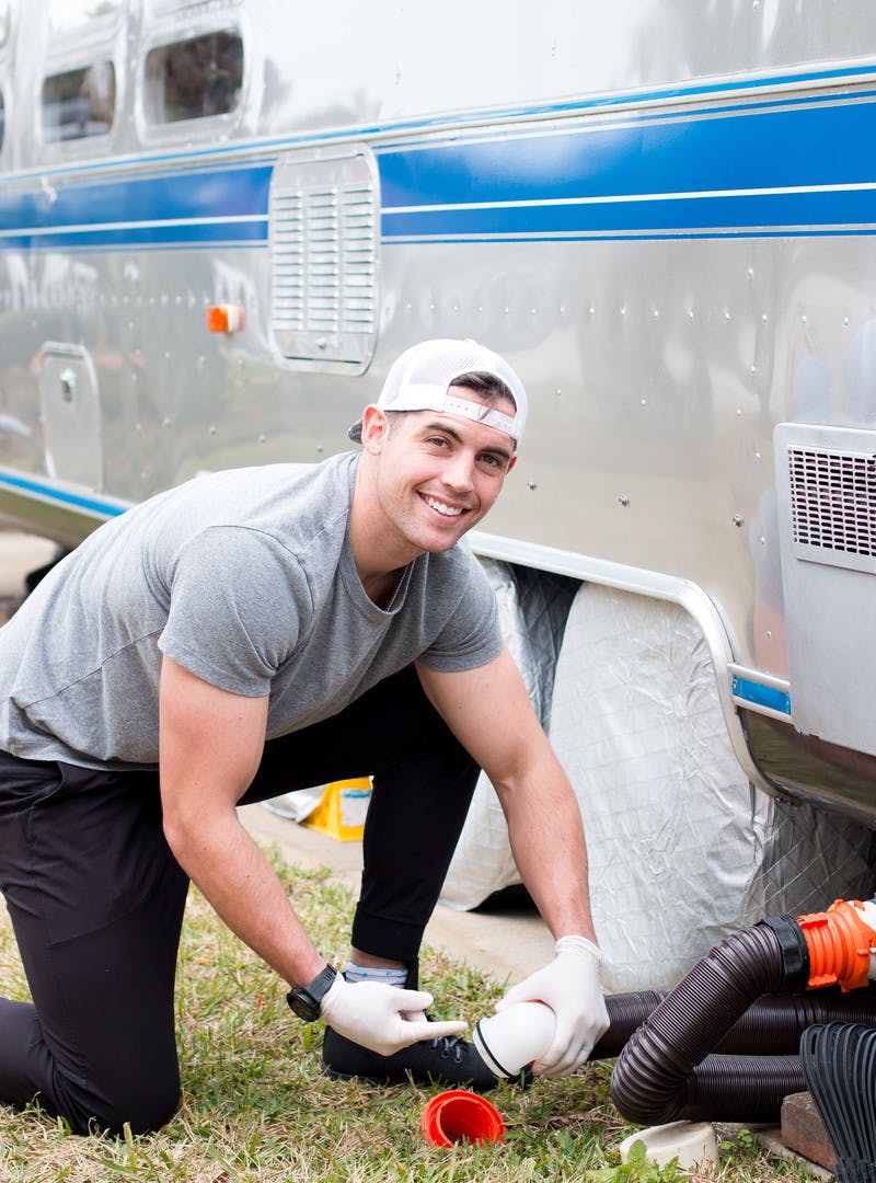 Mack Griffin pointing toward the hose to hook up first. 
