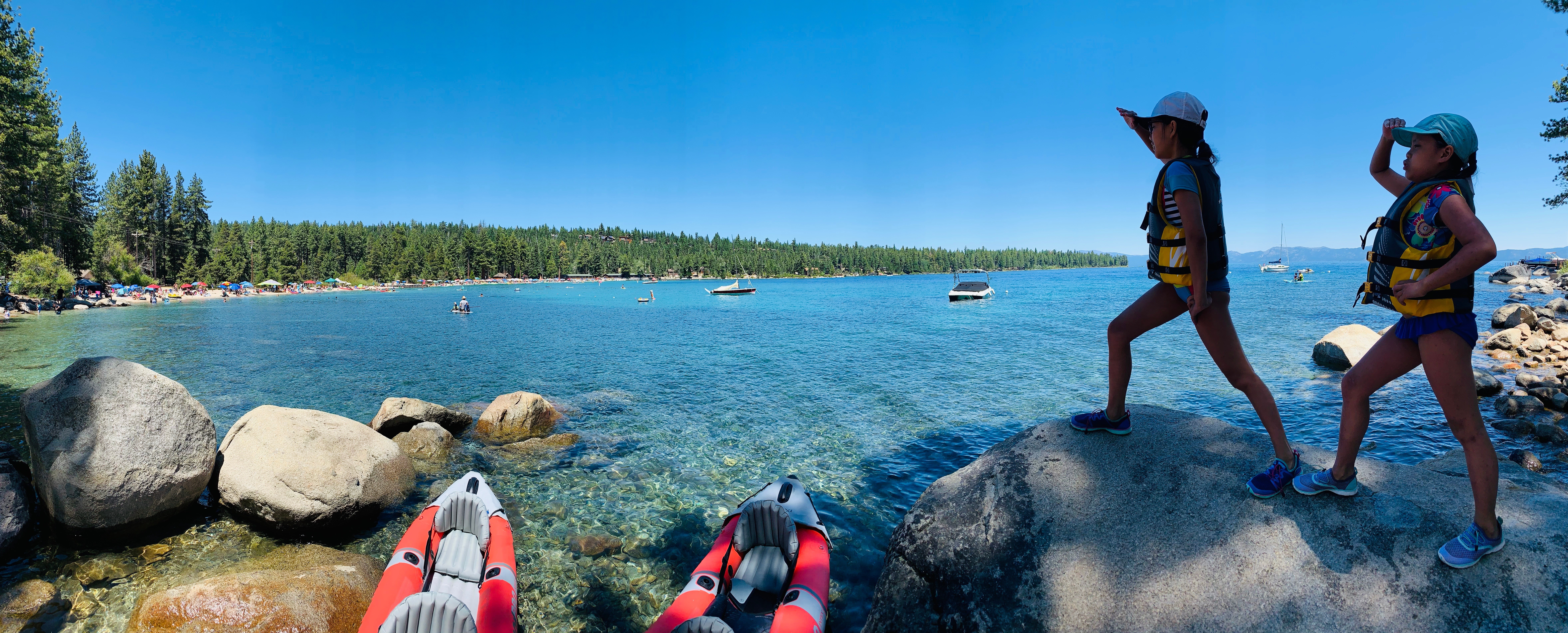 Brenda and Tiger's daughters acting like explorers on a rock