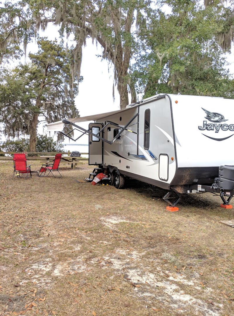 Ben and Christina McMillan's Jayco Jay Feather parked near the ocean in Florida.