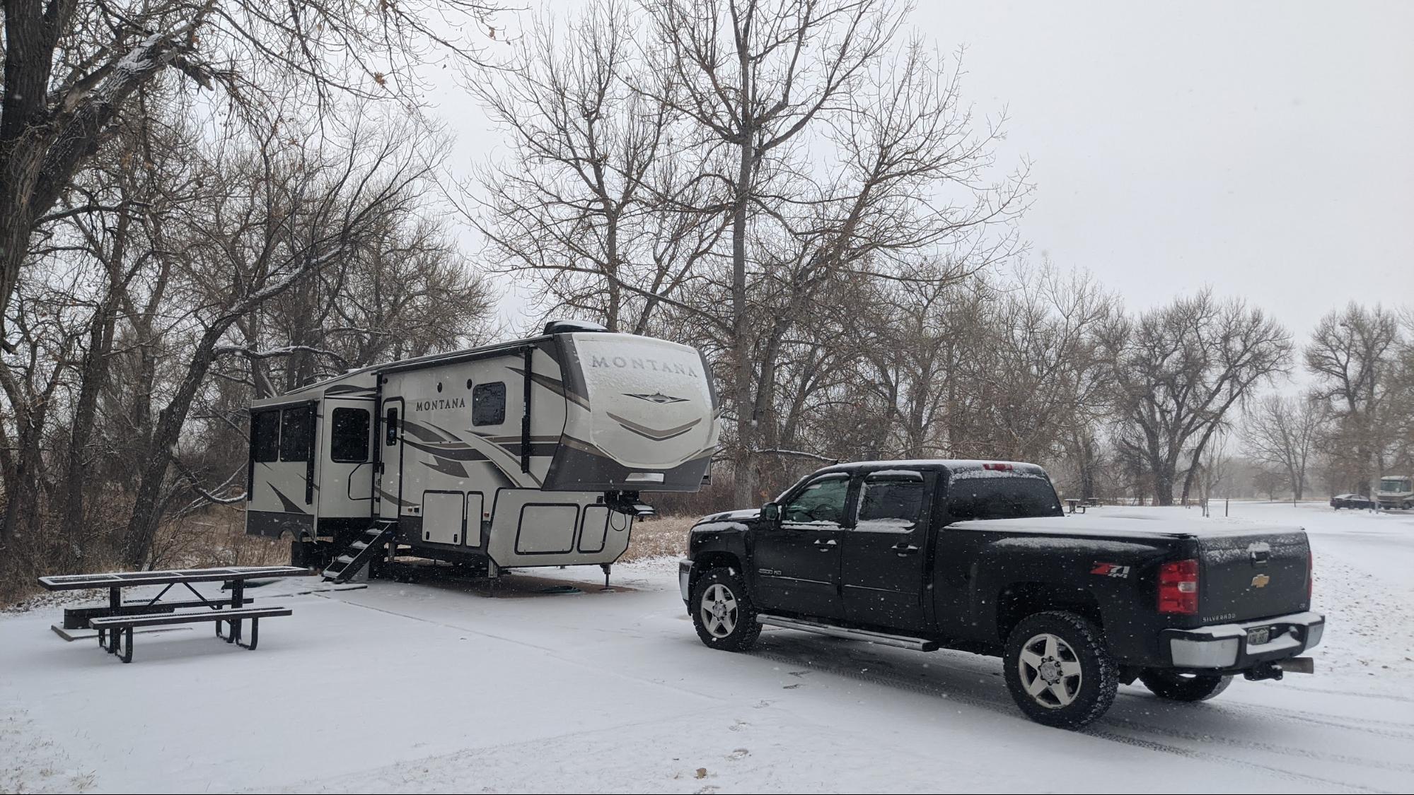Mike and Brittany Ciepluch's parked in the snow at a campground. 
