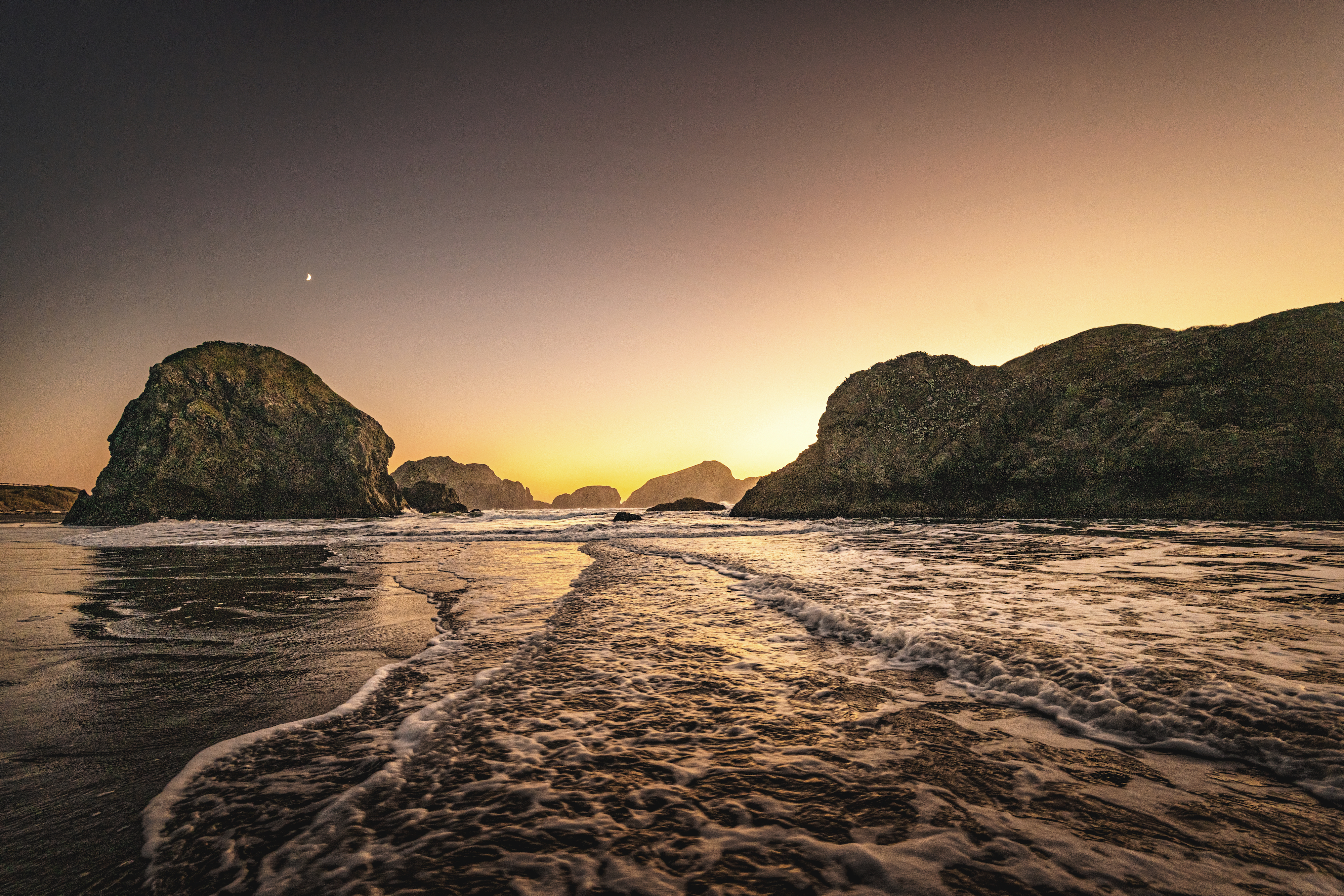 the rocky coast of oregon at sunset