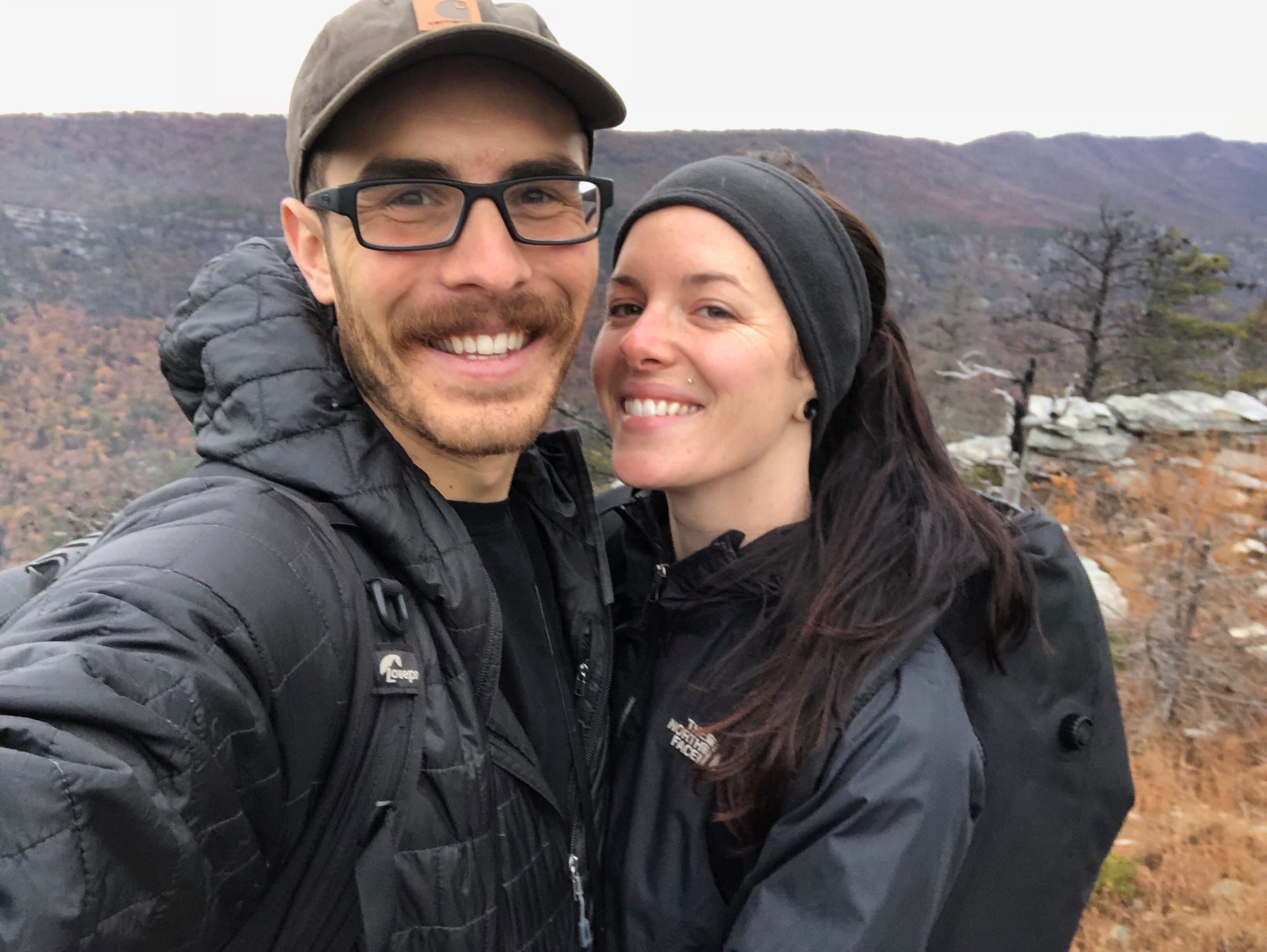 Jon and Aubrey taking a selfie in nature.