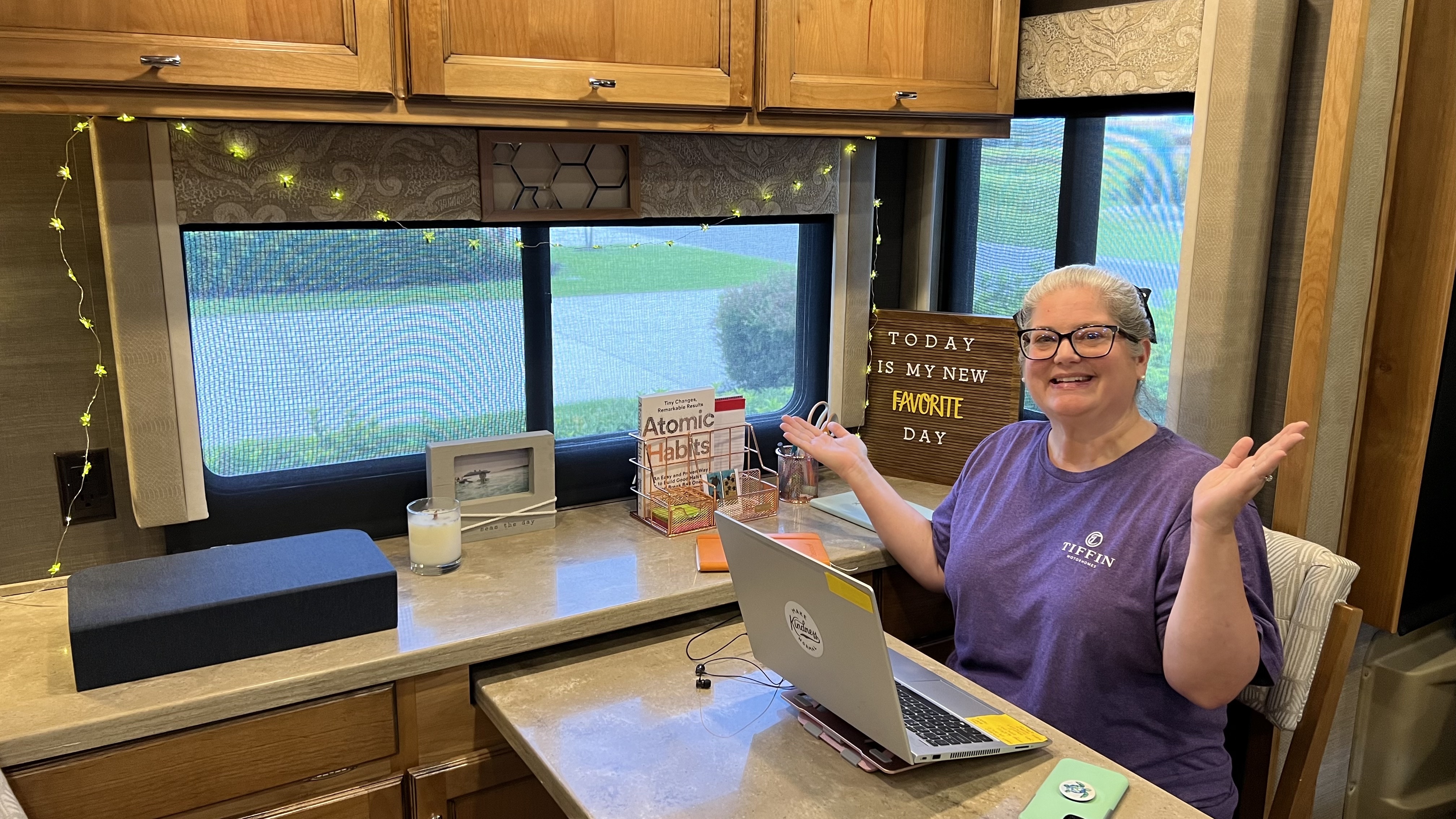 Tiffany Dunagan sitting at her designated workspace inside her Tiffin Motorhome RV
