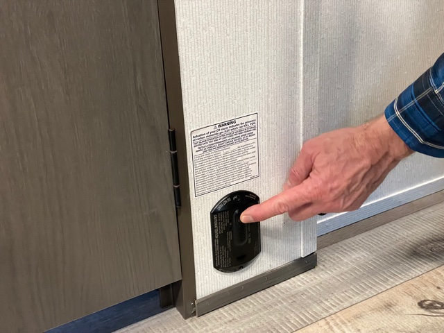 Matt Gleason checking a CO Detecter