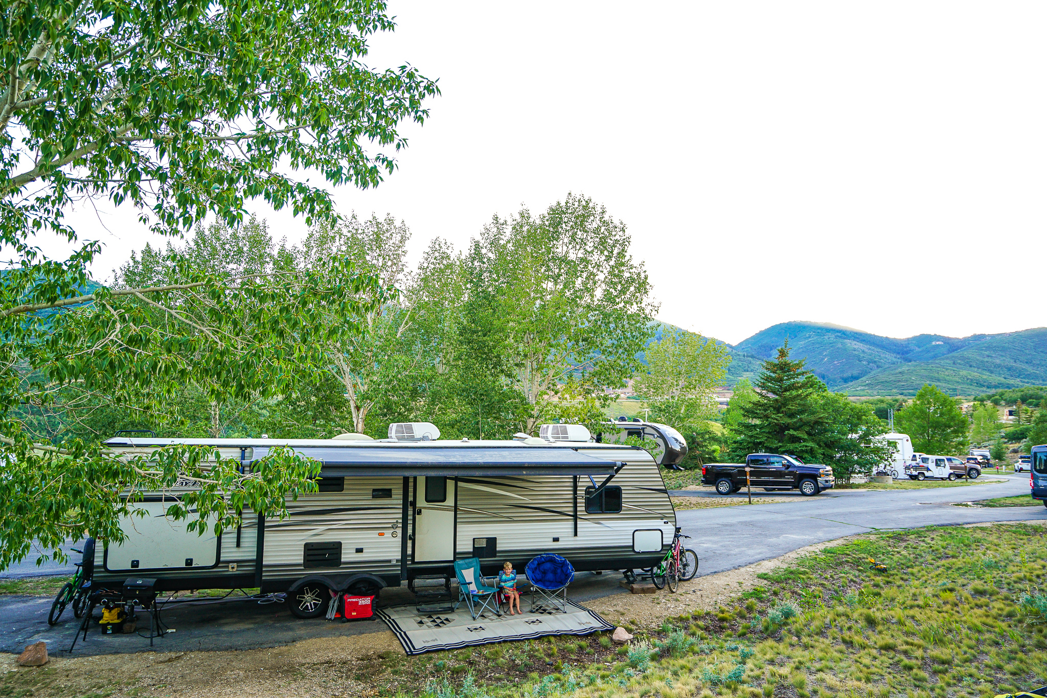 Renee Tilby's Jayco travel trailer at a grassy campsite