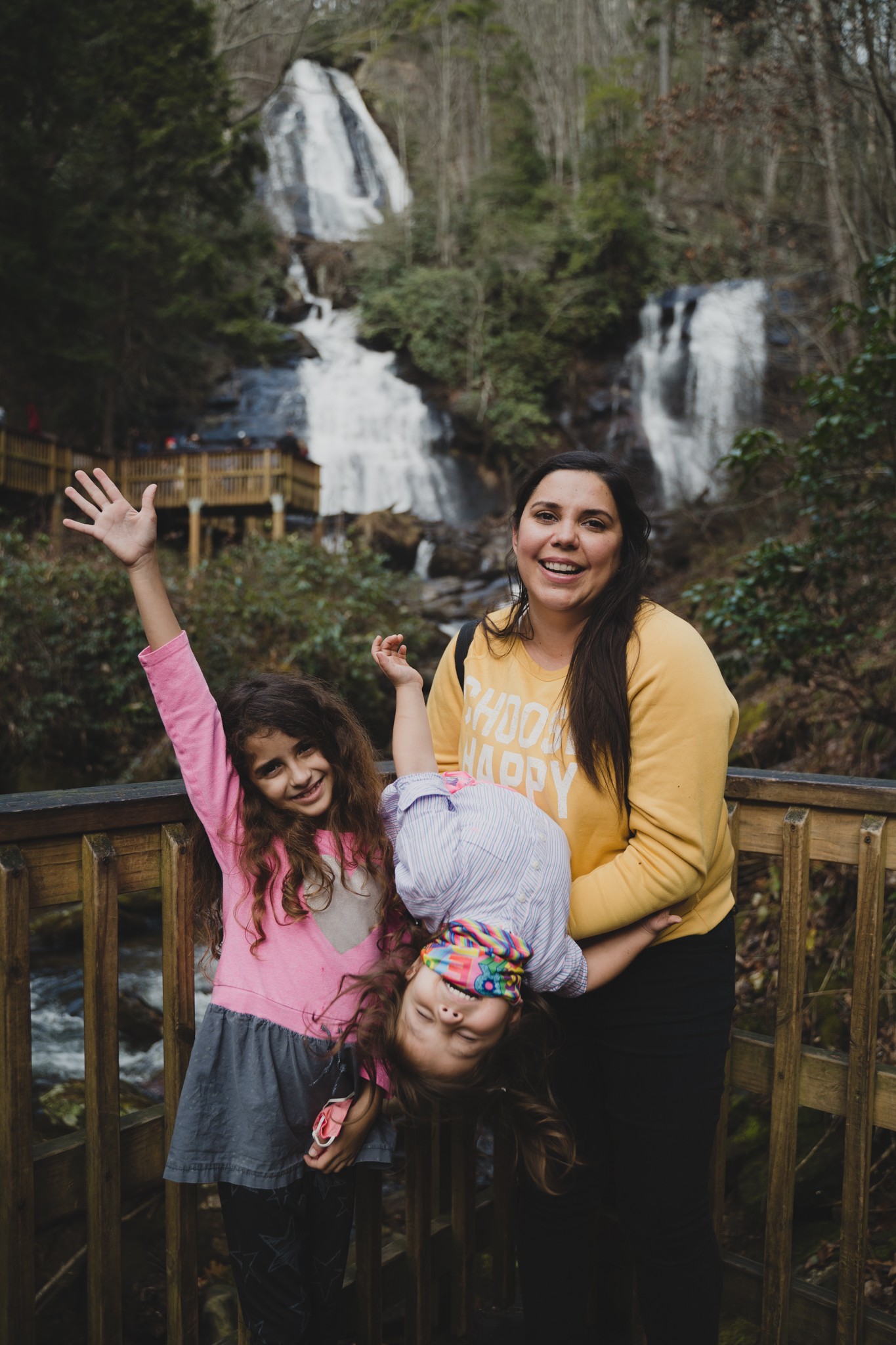 Johana Oropeza smiles with her daughters