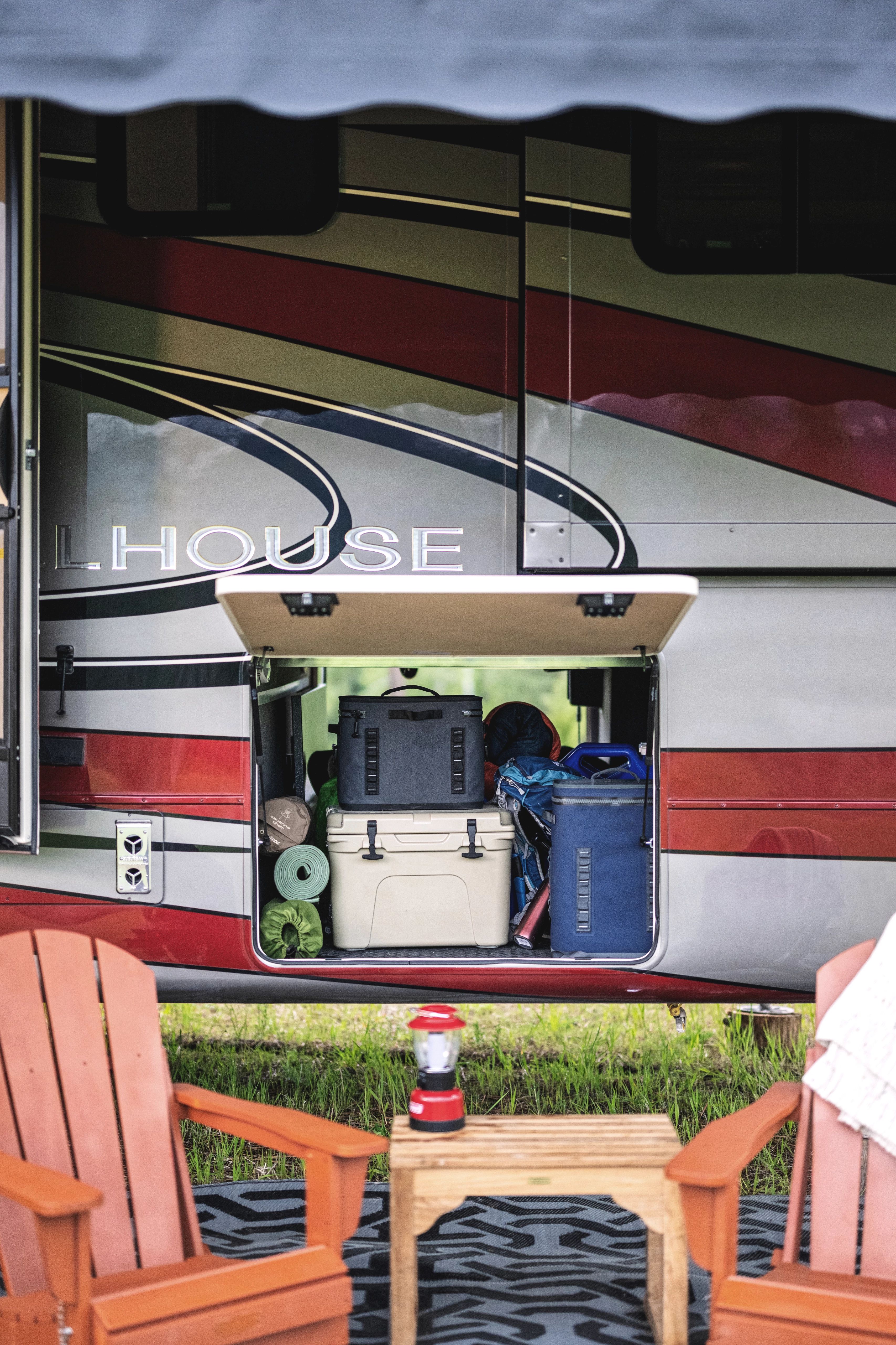 Camping gear in an garage storage compartment 