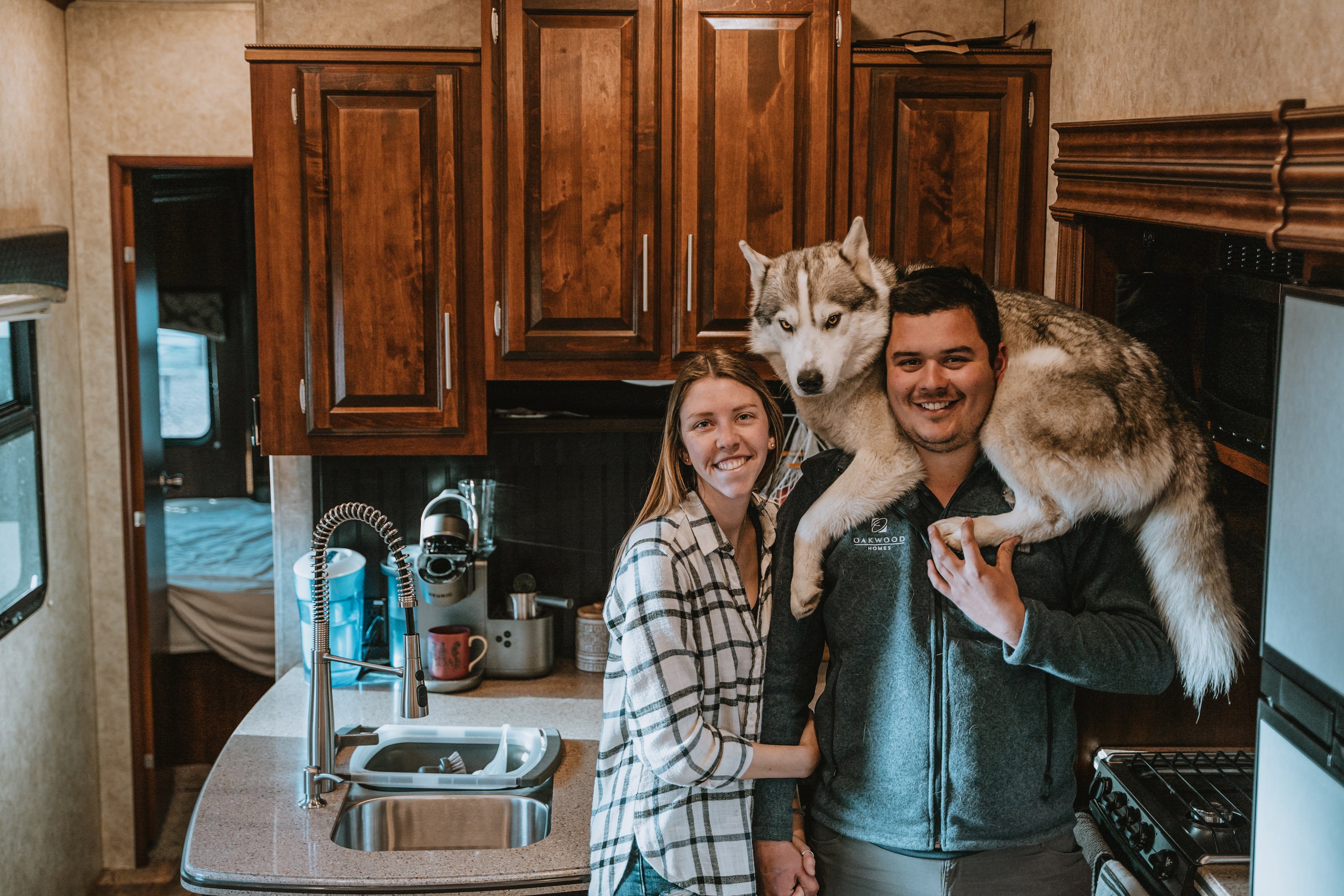 Jessica Shaw and her boyfriend Nico, with a husky on Nico's shoulders