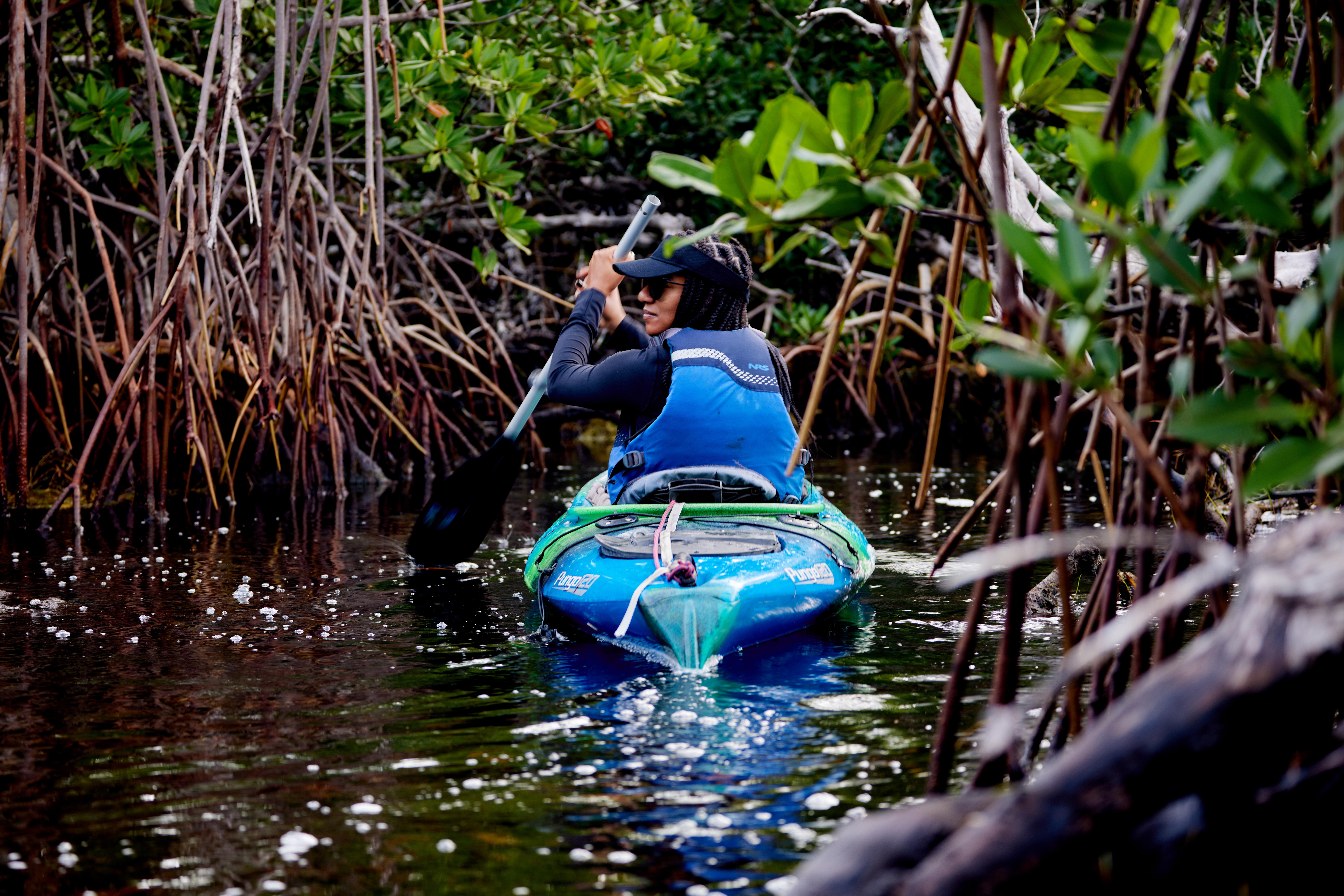 Travel writer Adrienne Jordan kayaks in mangroves in the Florida Keys.