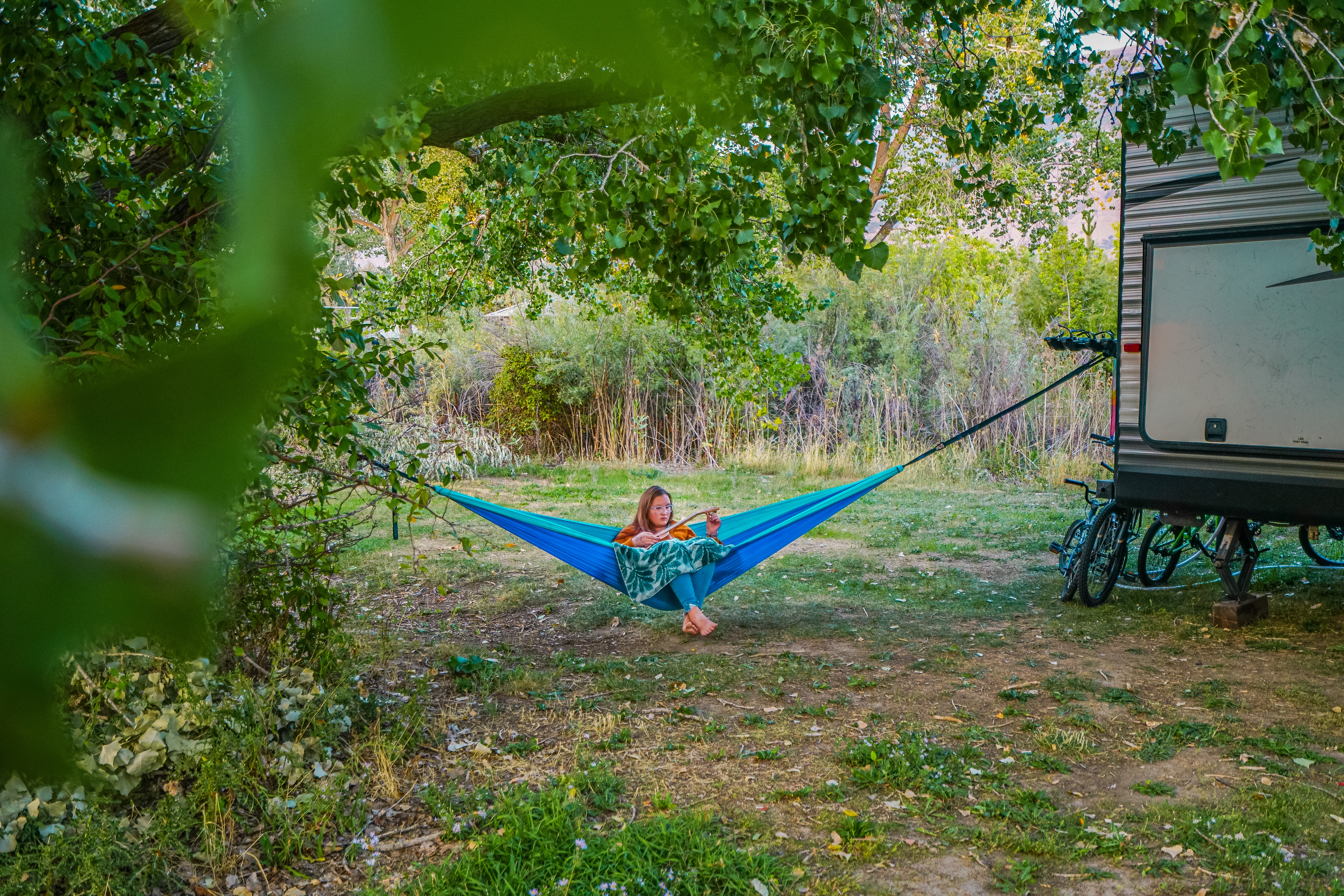 Renee Tilby's child in a parachute hammock