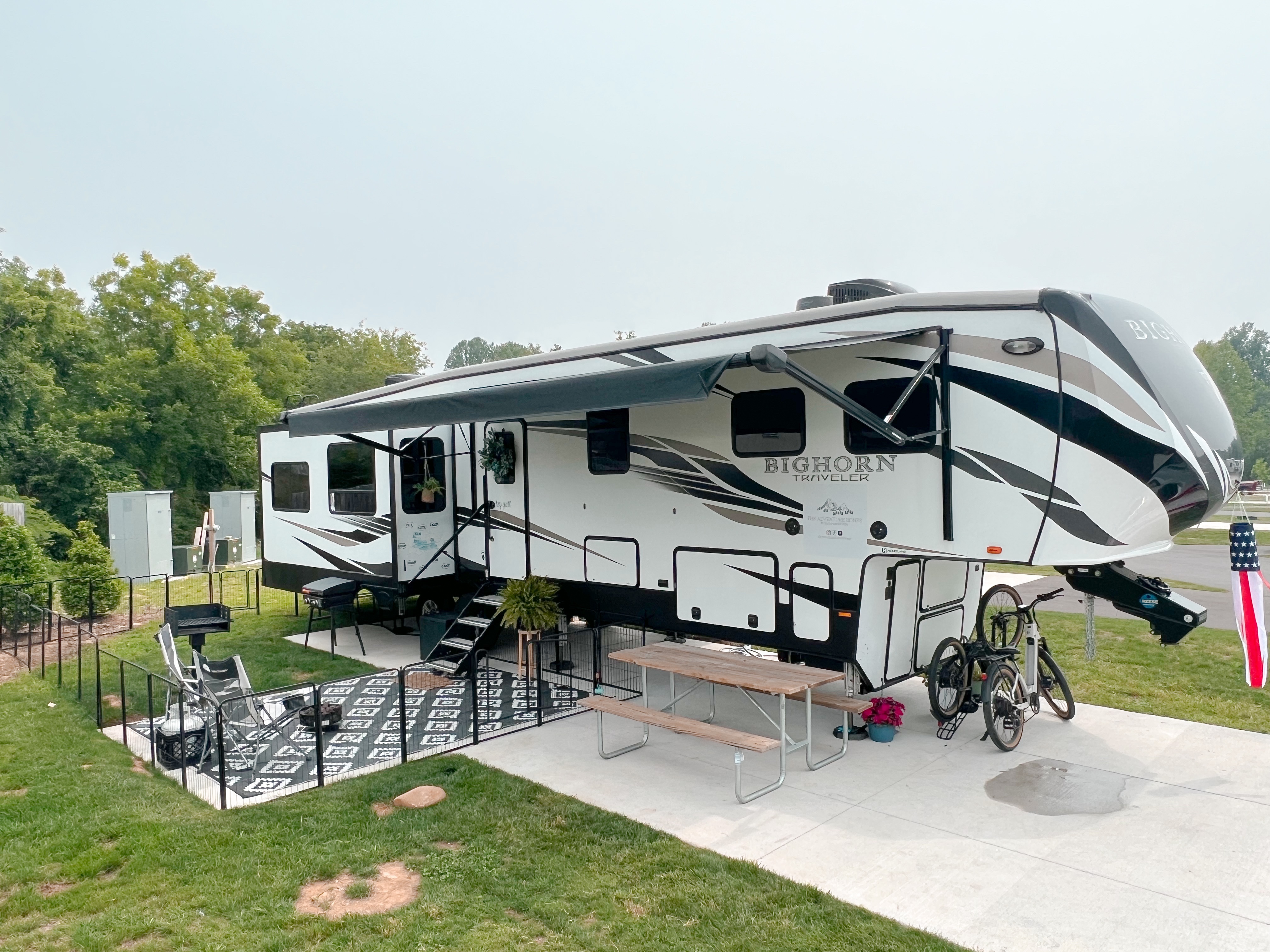 Amanda and Darren Bone family, Heartland Bighorn Traveler 39MB fifth wheel, exterior with picnic table