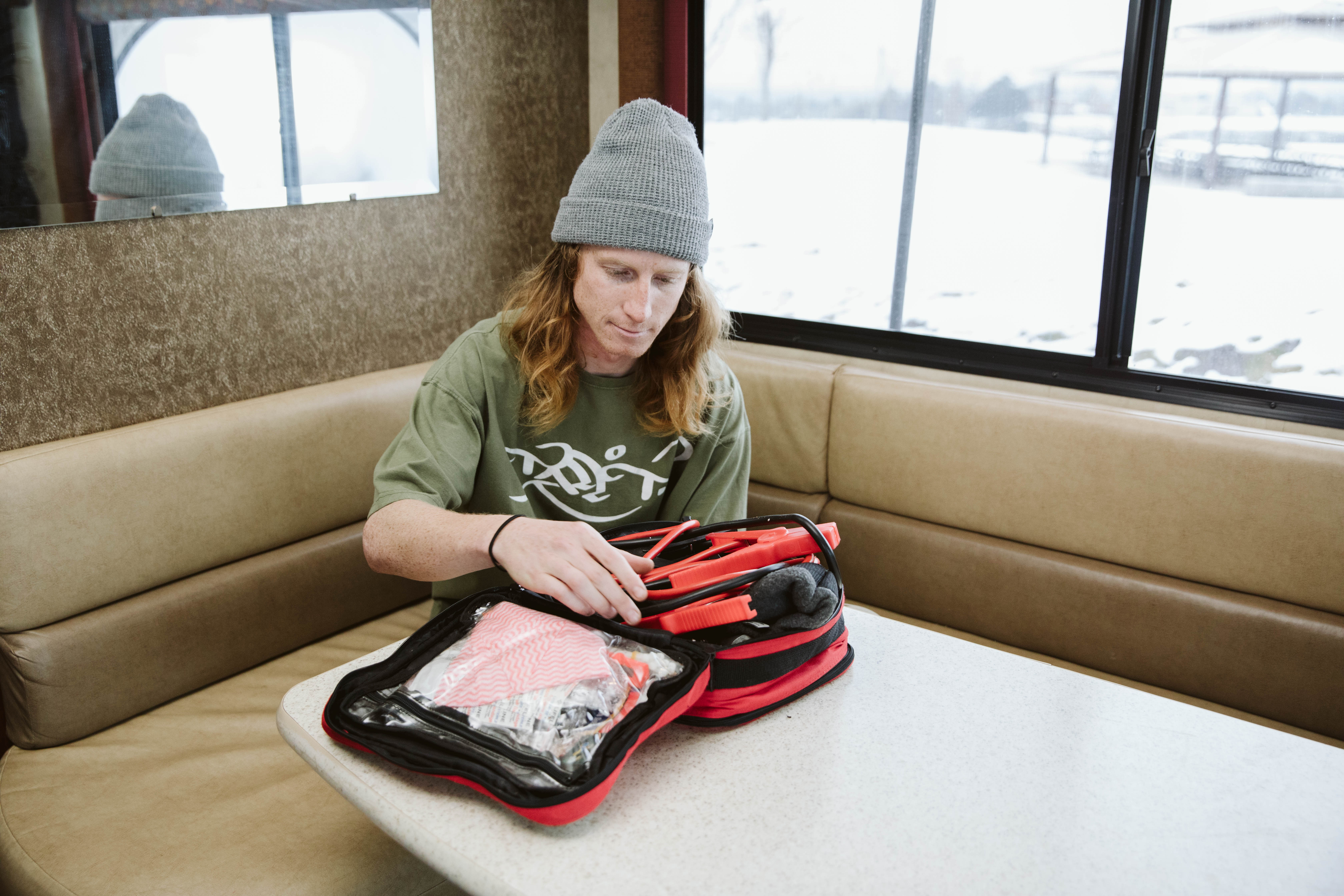 Packing up tools and gear for winter camping. 