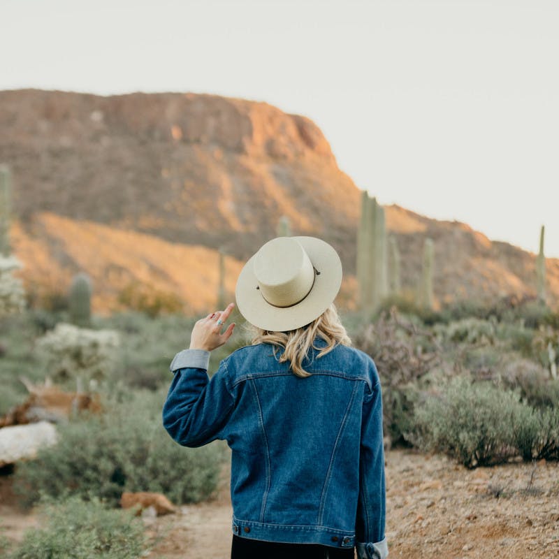 Image of Natalie Allen looking out into the open desert.