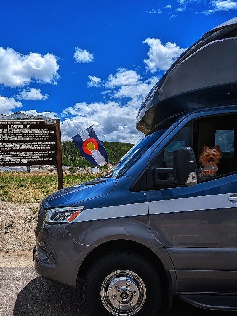 Dustin and Sarah Bauer's RV parked in front of a sign for Leadville.