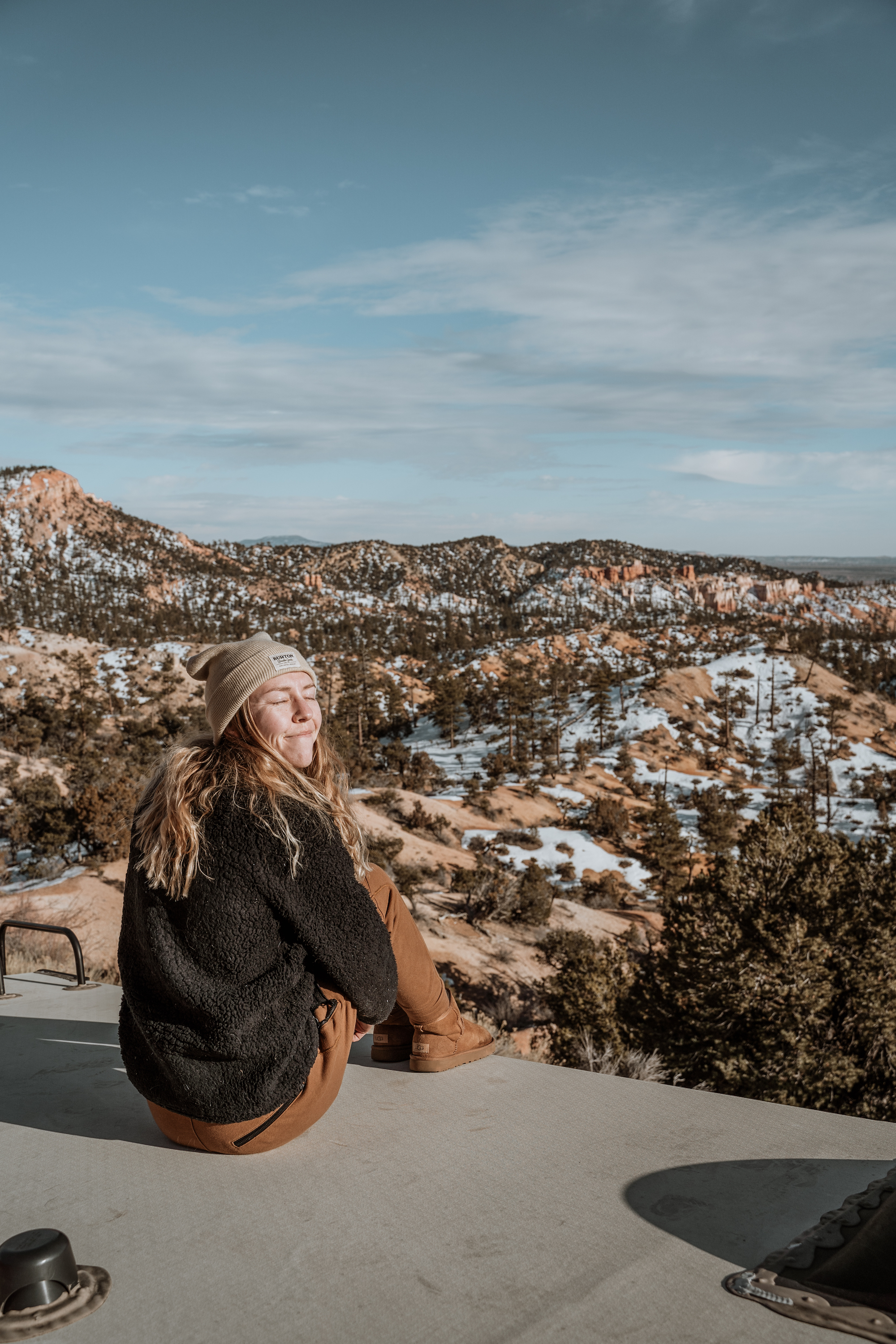 Jessica Shaw sitting on top of her RV.