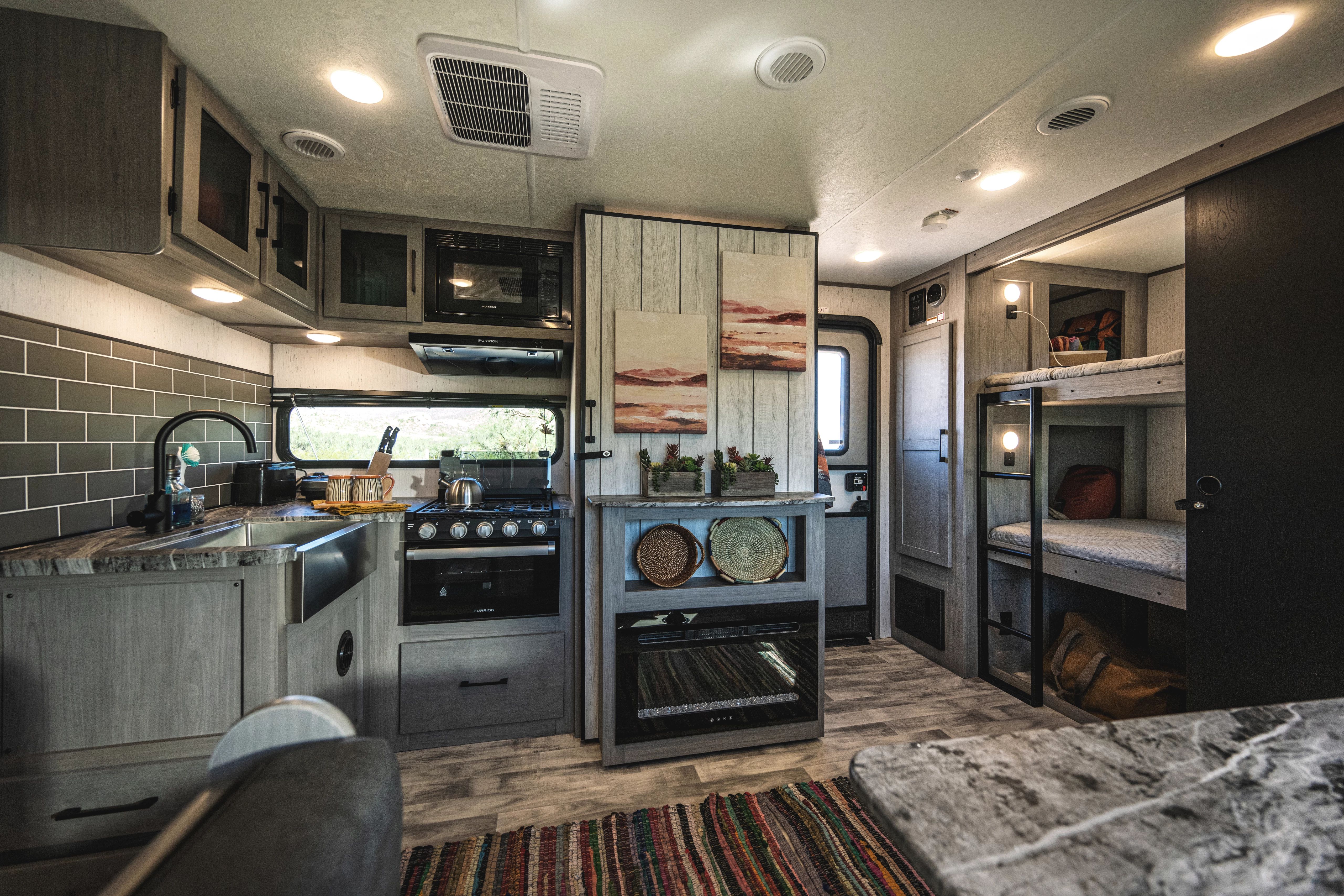 Dutchmen Kodiak kitchen and bunk area