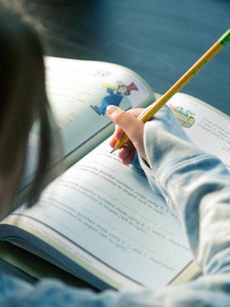 Rose Roberson works in a workbook