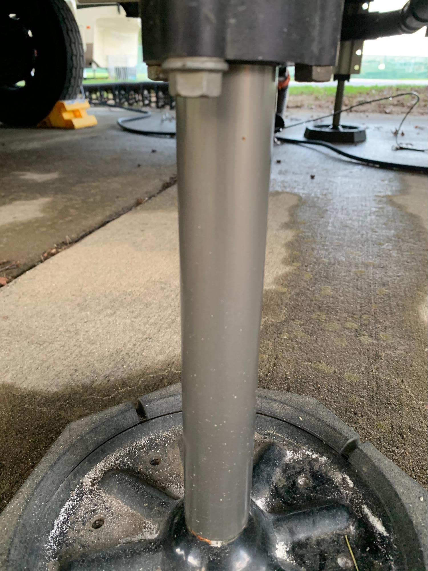 Tom Boswell showing where there might be debris on jacks.