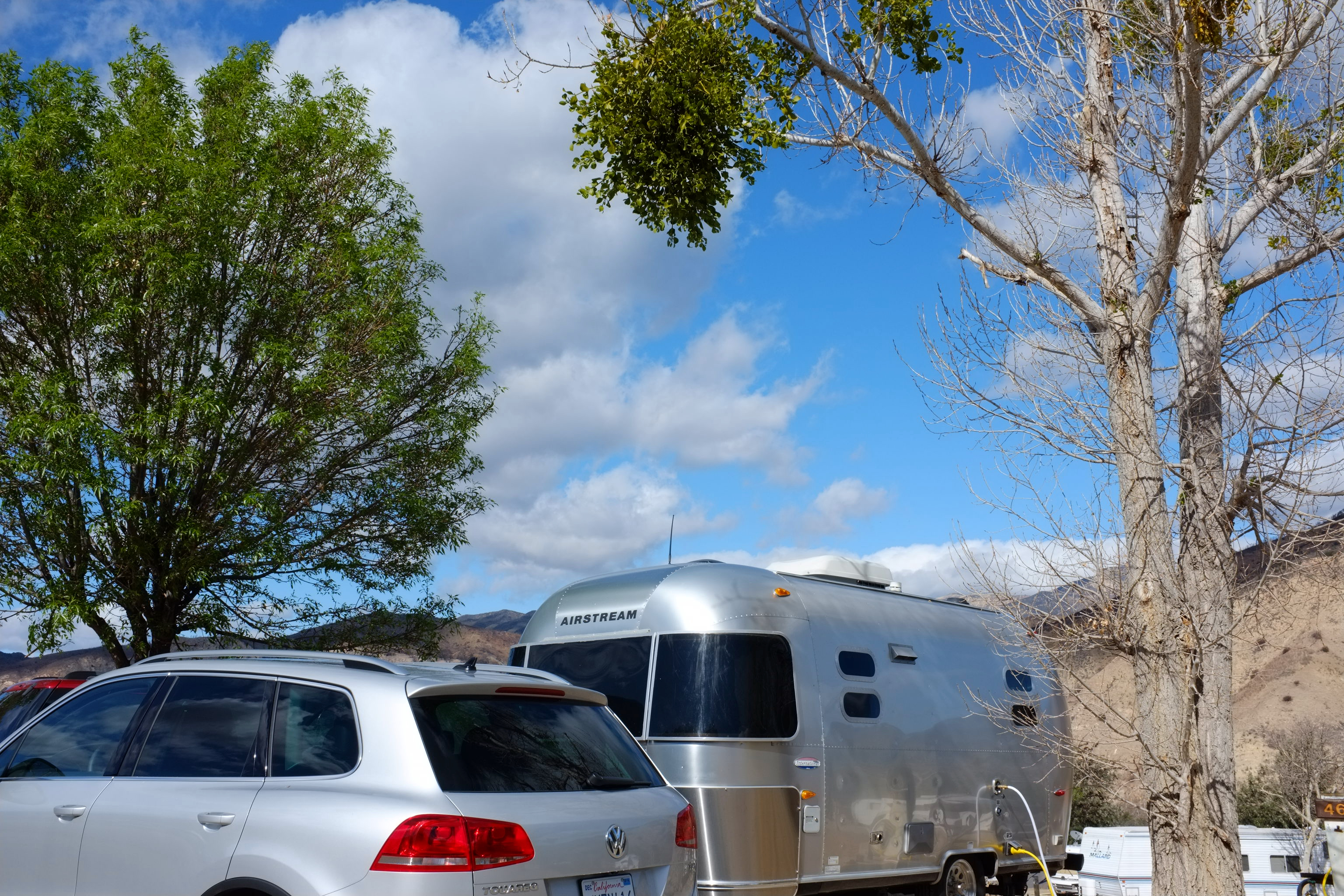 Dr. Na's Airstream parked at a campsite.
