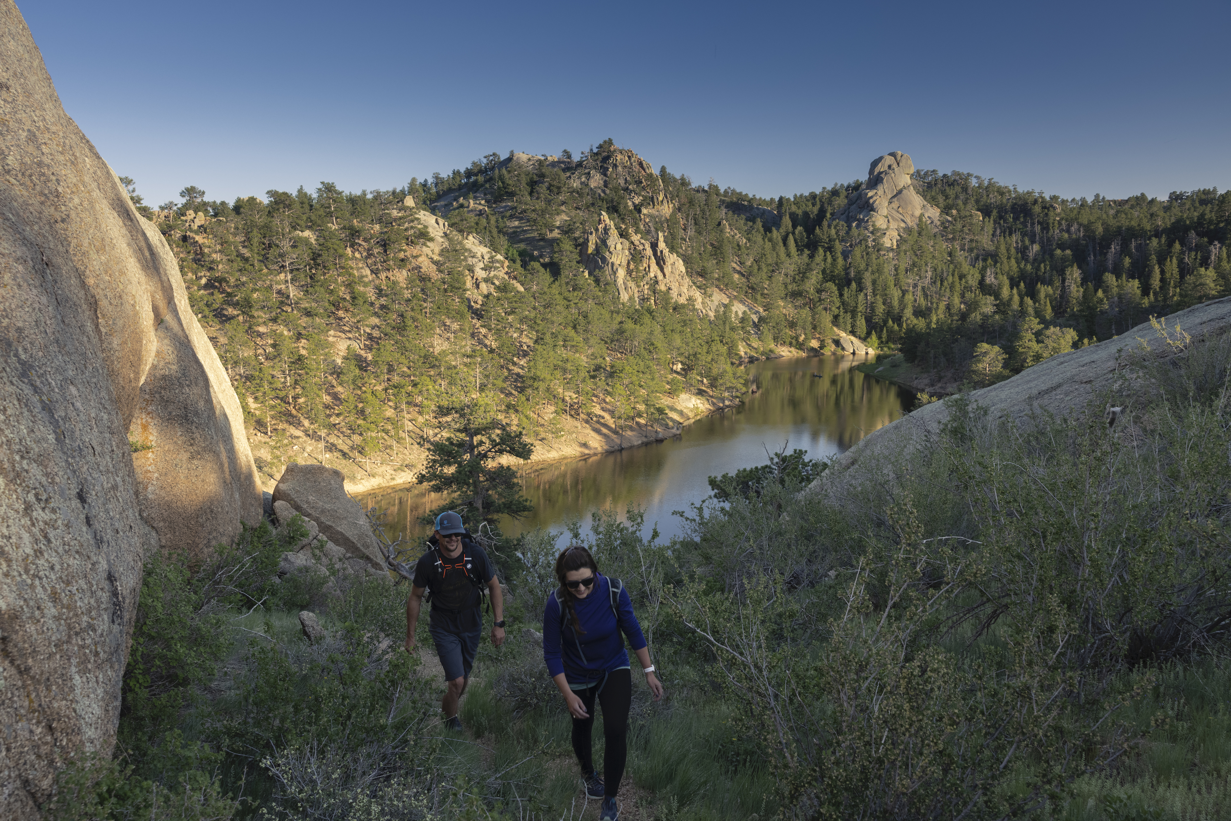 Dustin and Sarah hiking near a river