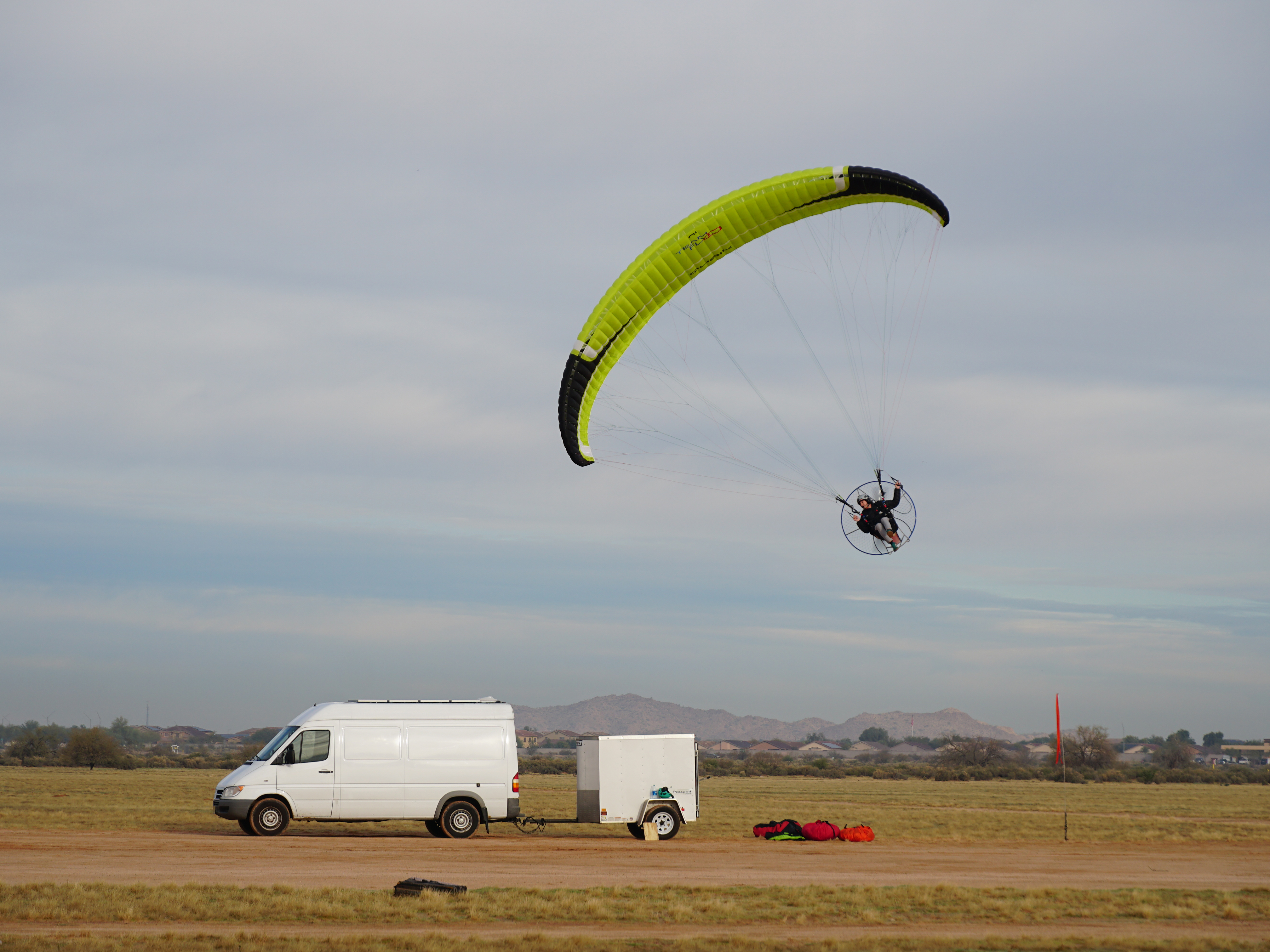 Tucker Gott takes off the ground on his paramotor. 