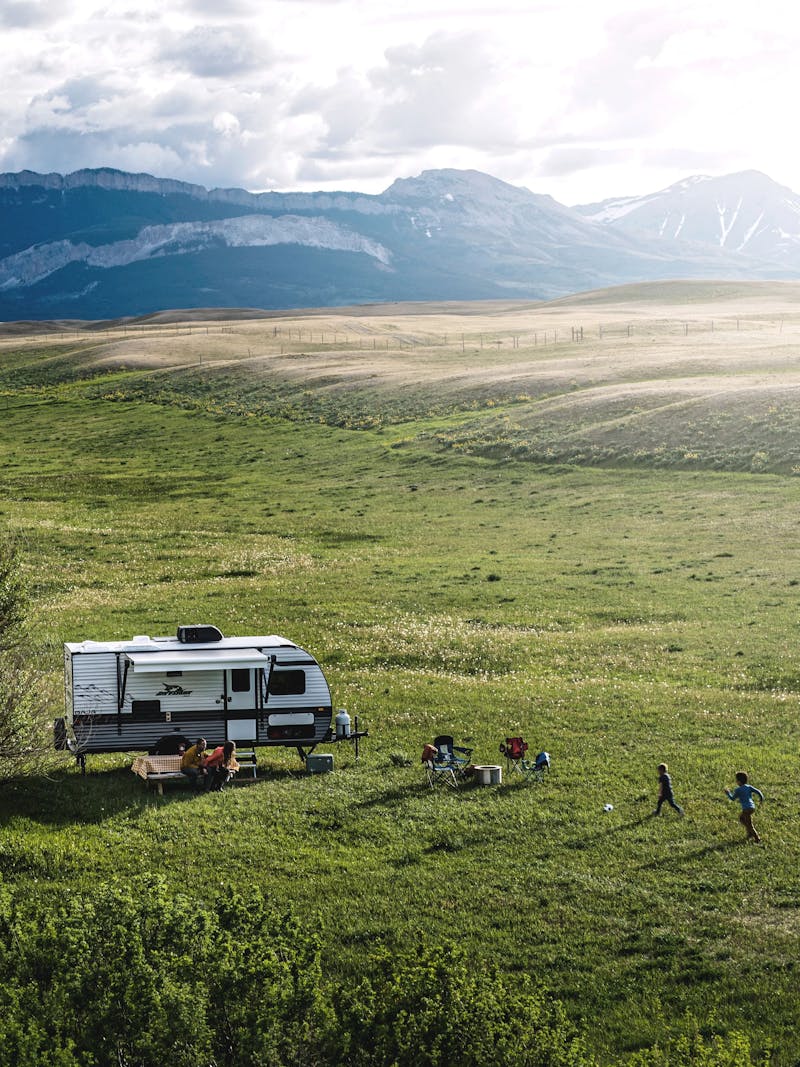 A Jayco Jay Flight Baha Lightweight Travel Trailer boondocking near moutains