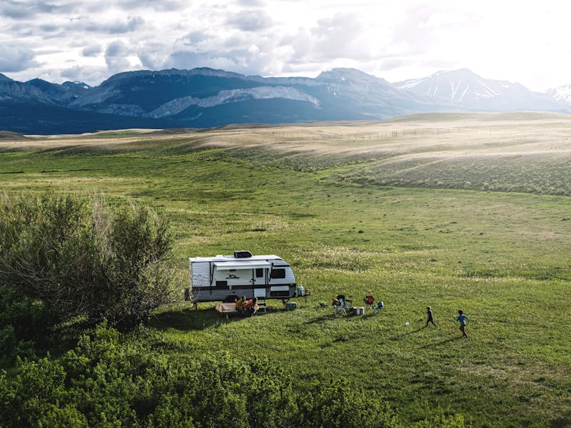 A Jayco Jay Flight Baha Lightweight Travel Trailer boondocking near moutains