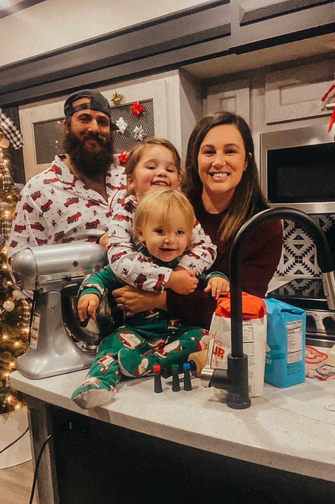 Sammy Seles' family smile for a photo inside of the kitchen of their Keystone Montana. 