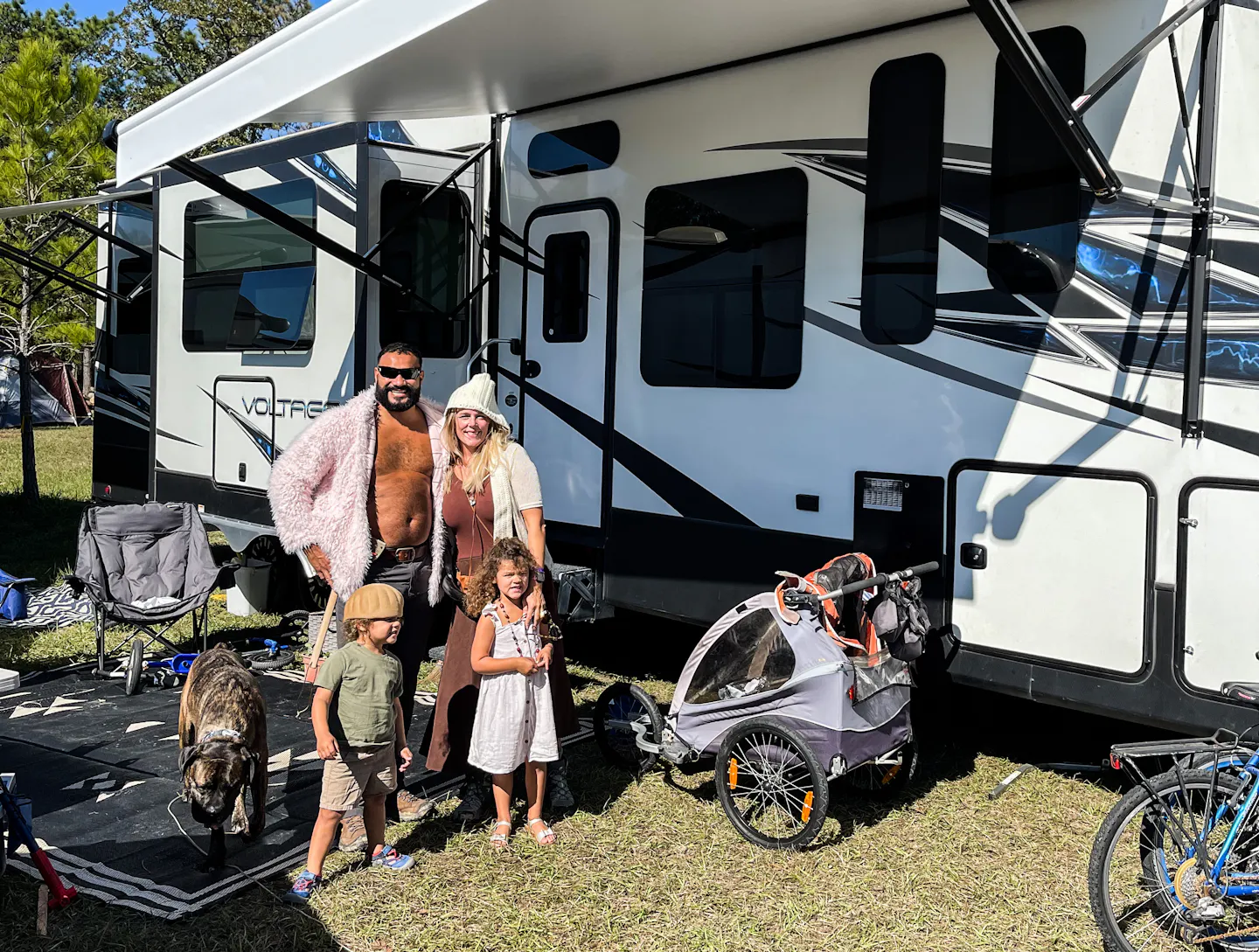 Samantha Edmunds and her family in front of their RV at the Texas Renaissance Festival

