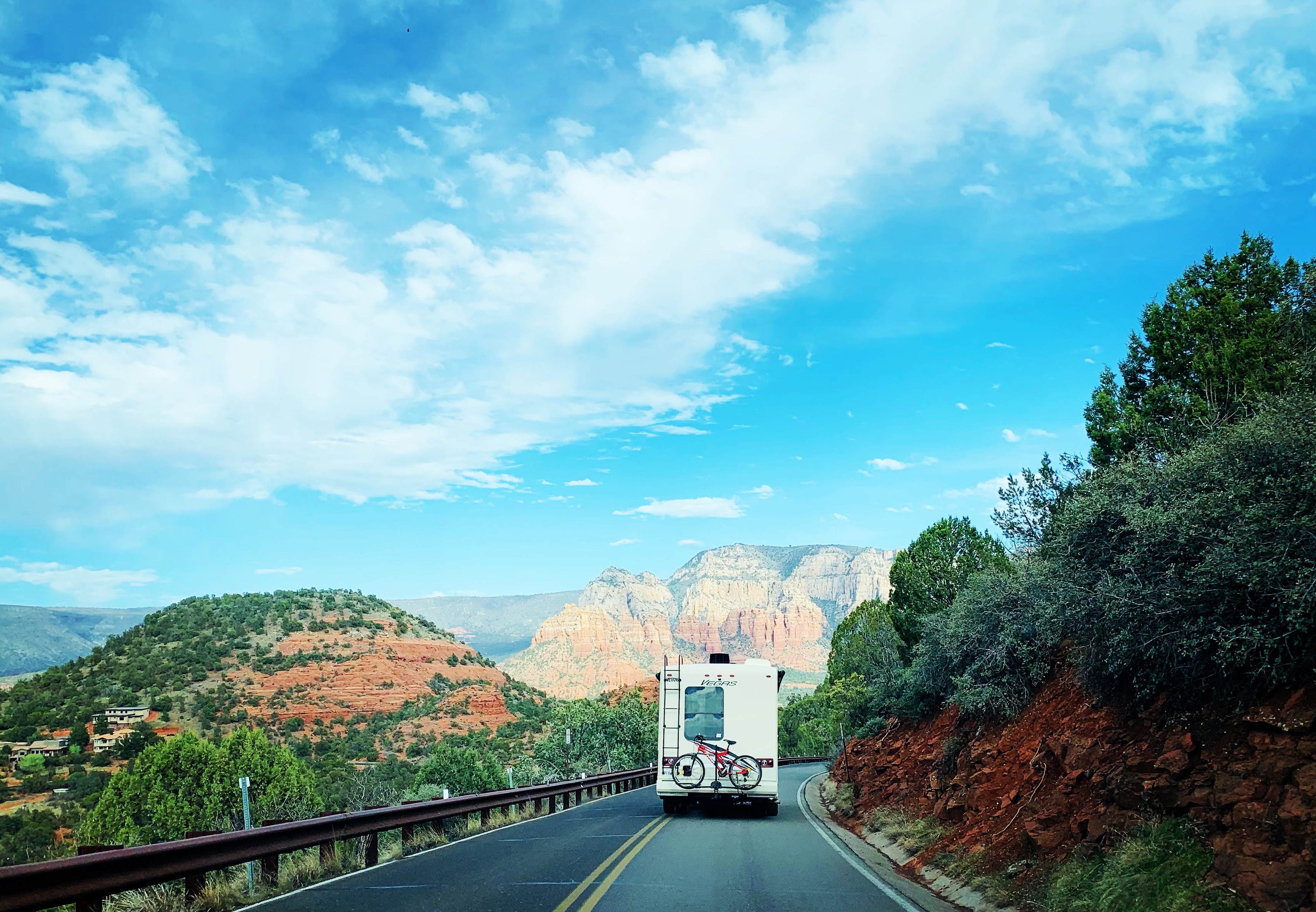 BRENDA & TIGER's RV driving down the road in ARizona