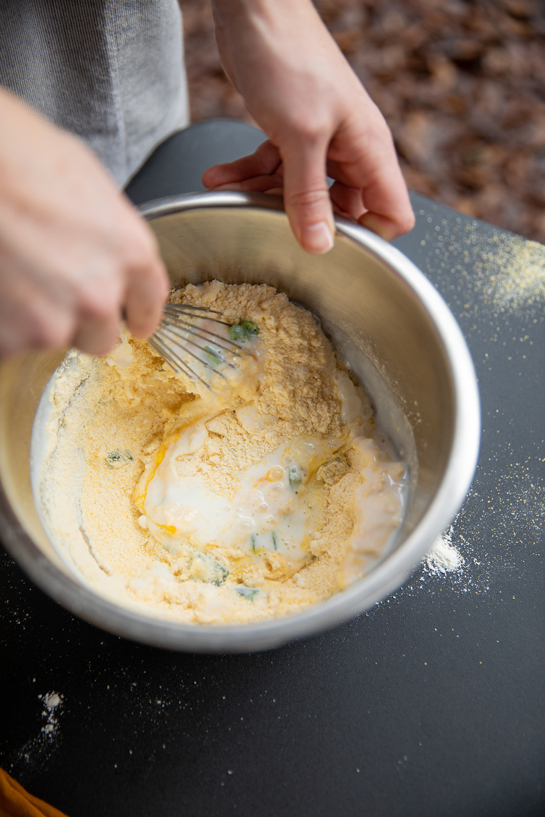 Mixing up the batter for hush puppies. 