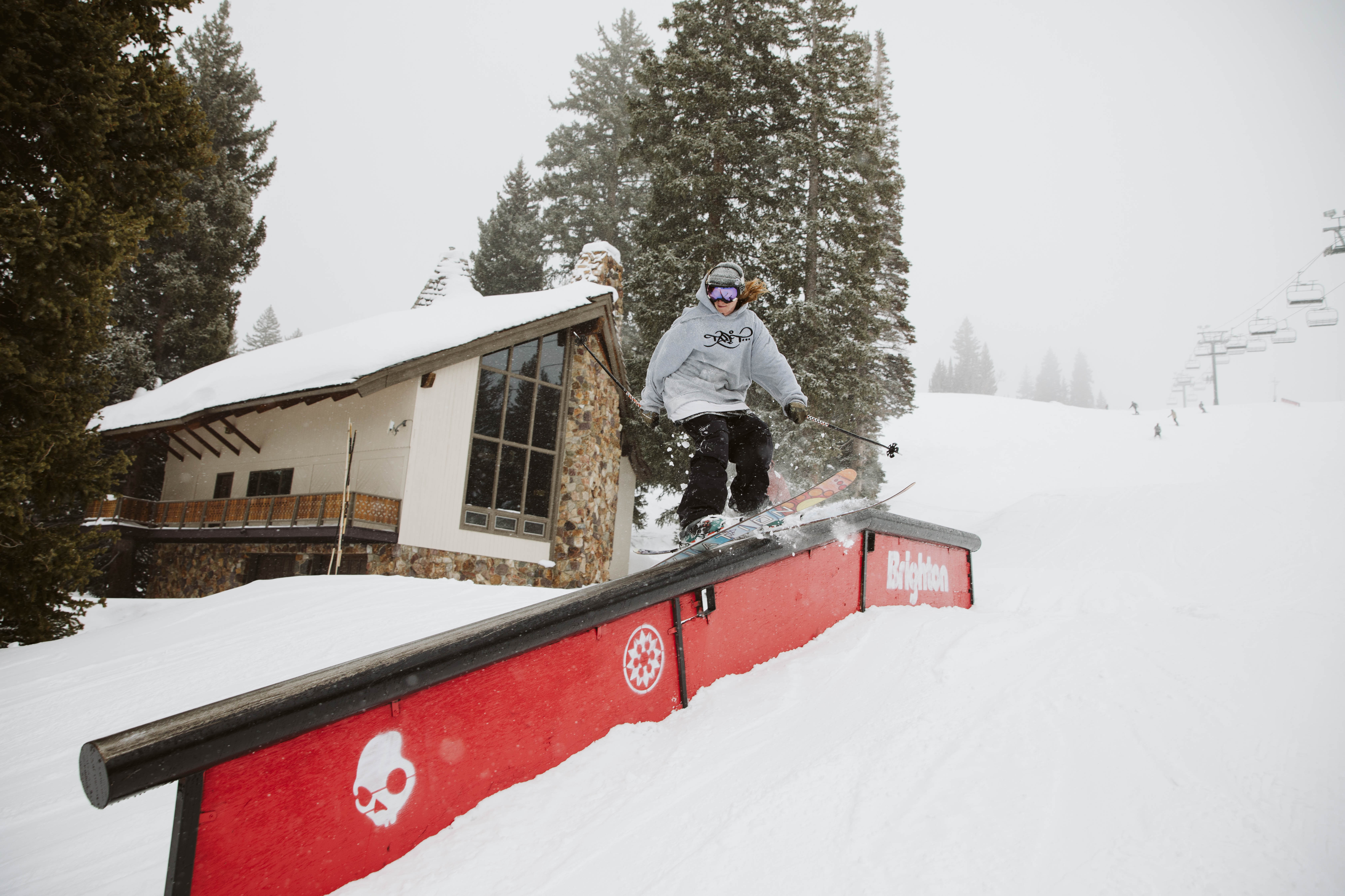 Ryan skiing down a rail. 