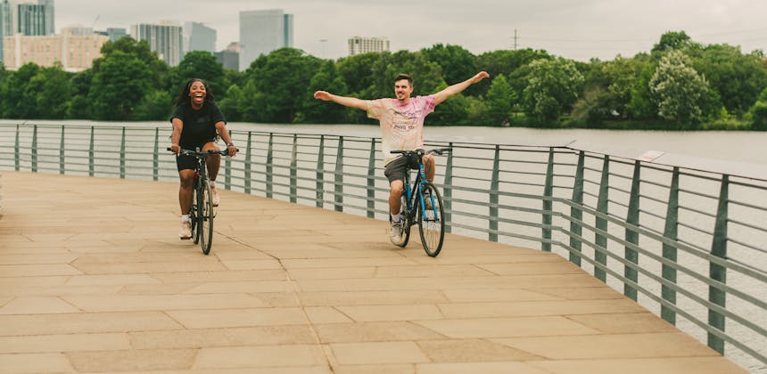 Jessy and Jim McFarlin riding bikes.