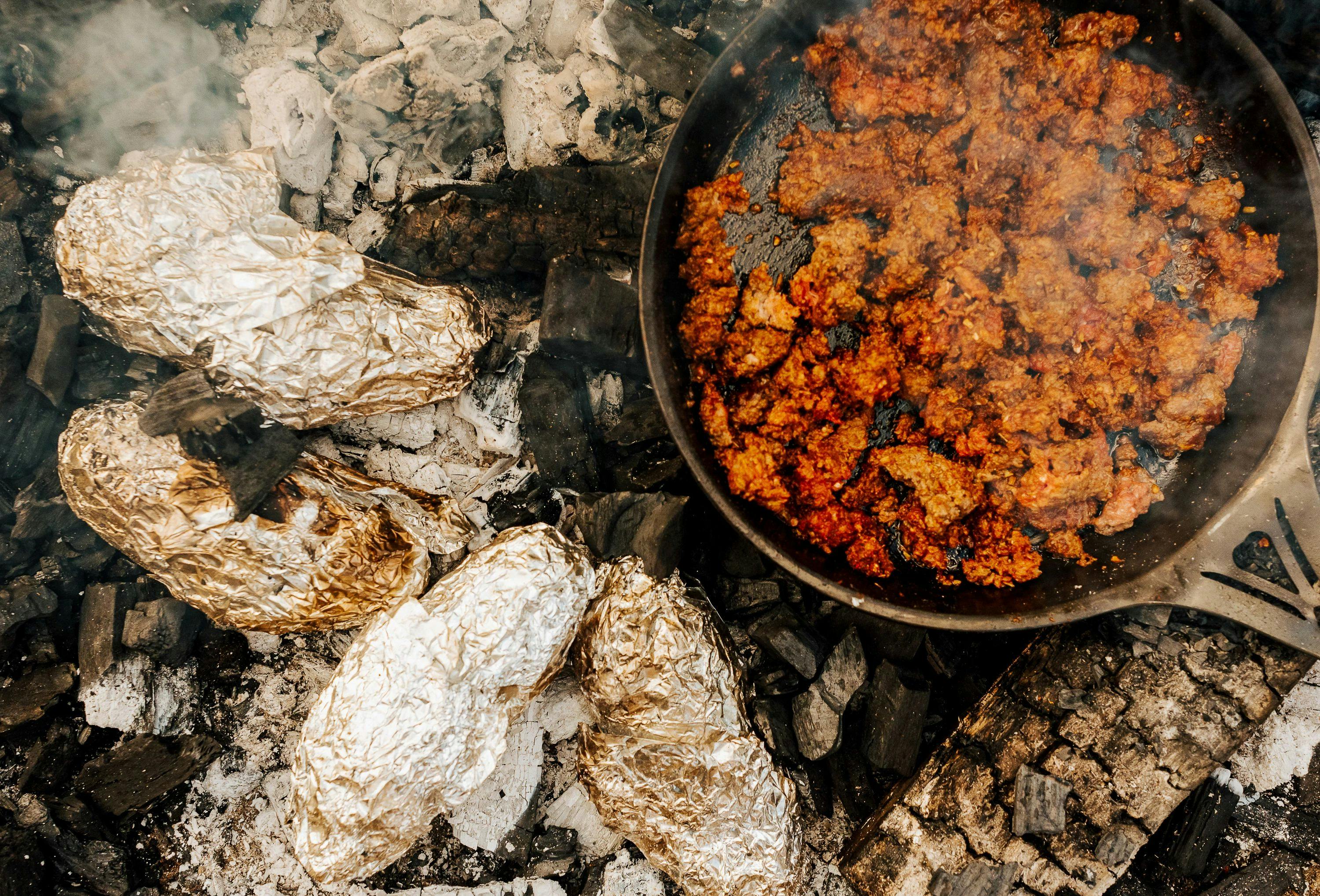 pork and venison cooking in a skillet