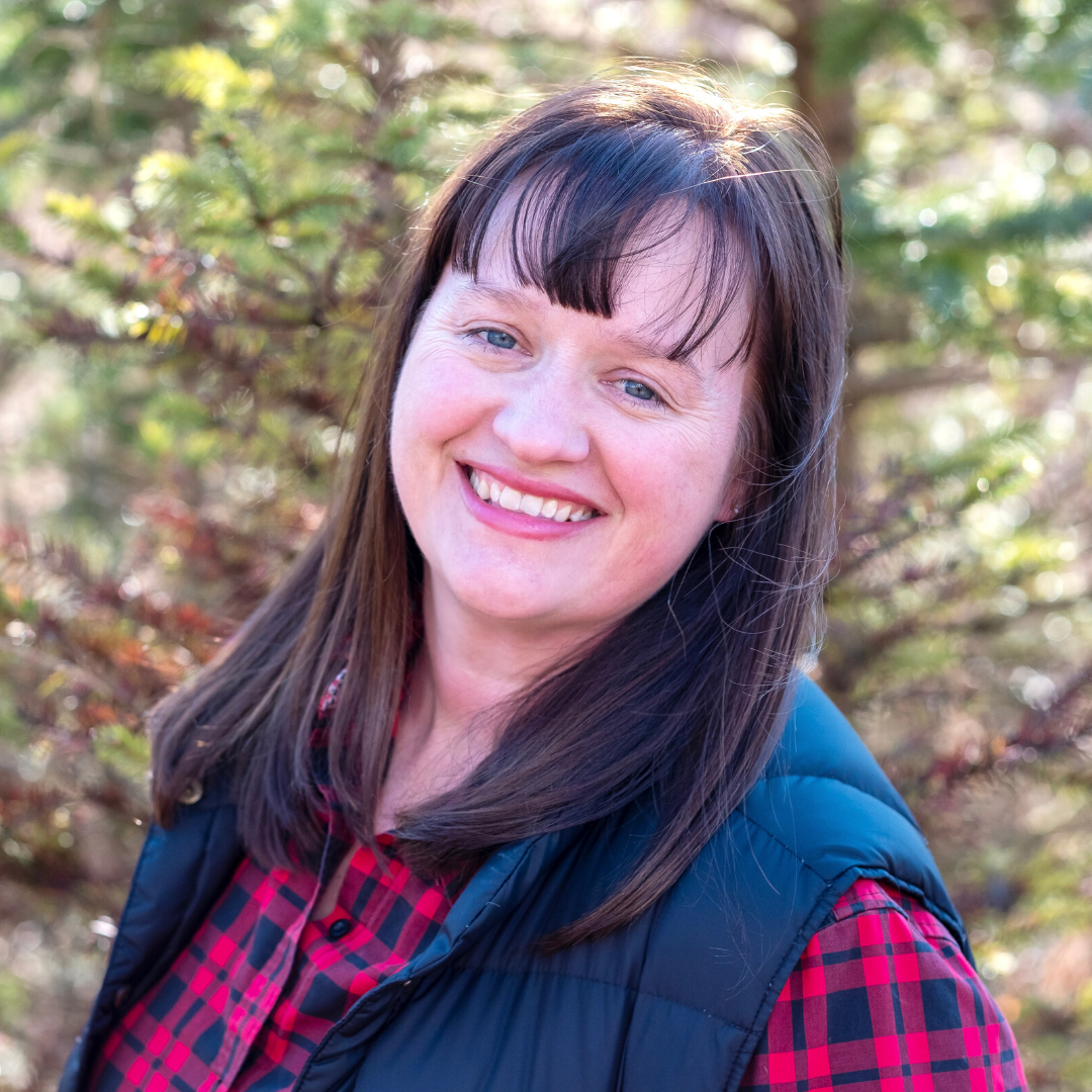 A headshot of Brandy Gleason outside.