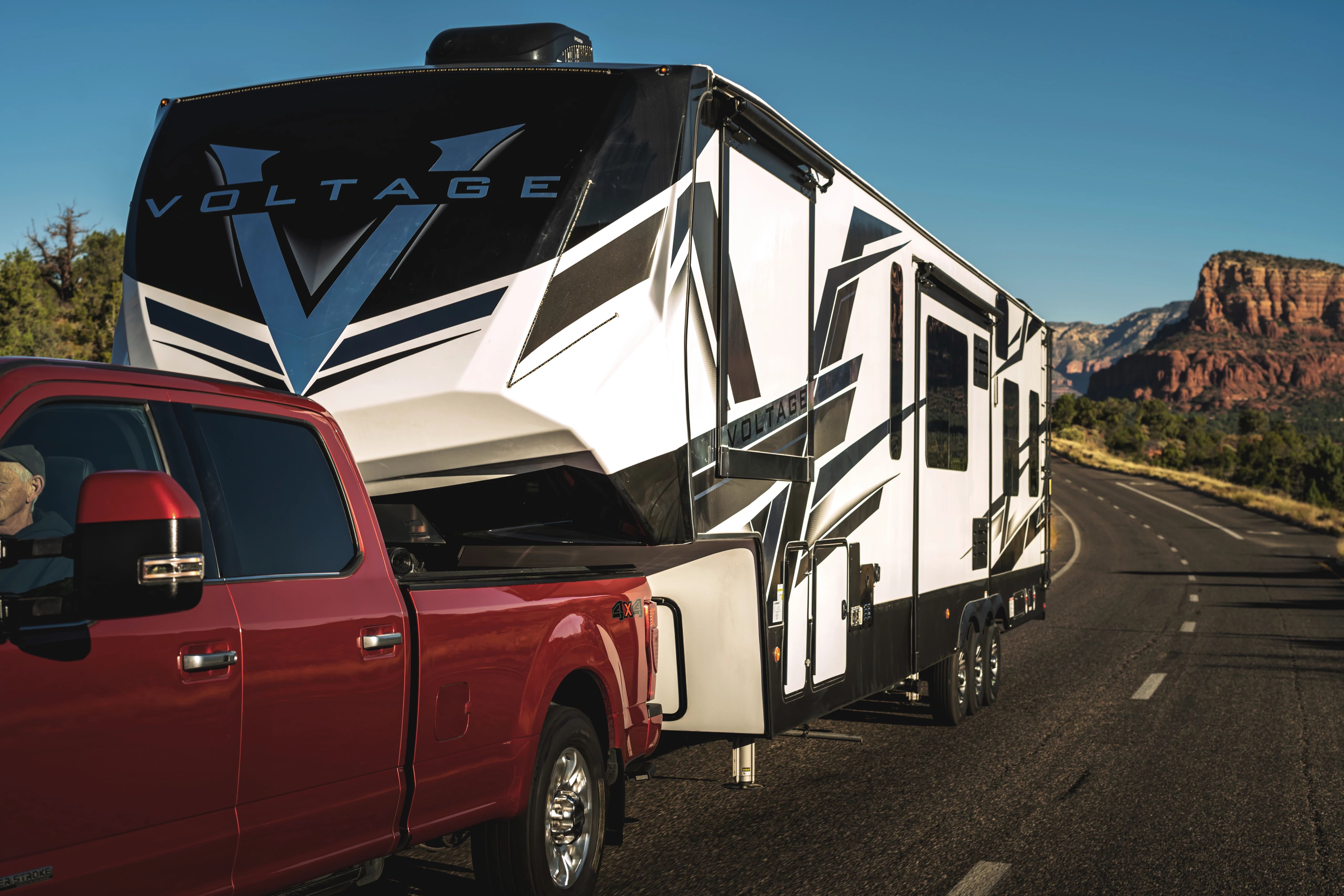 A Dutchmen Voltage being towed down a road