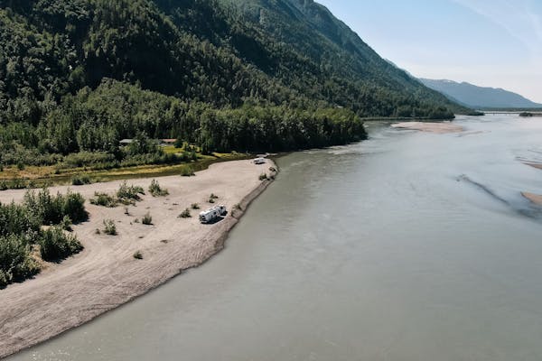 An aerial view of Karen Blue's RV parked alongside a lake