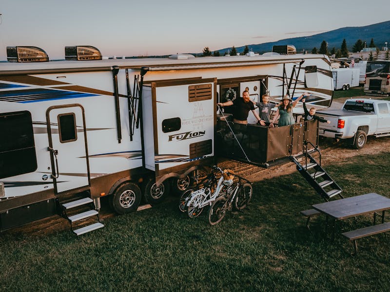 Kris & Andy Murphy's family pose on the patio of their RV
