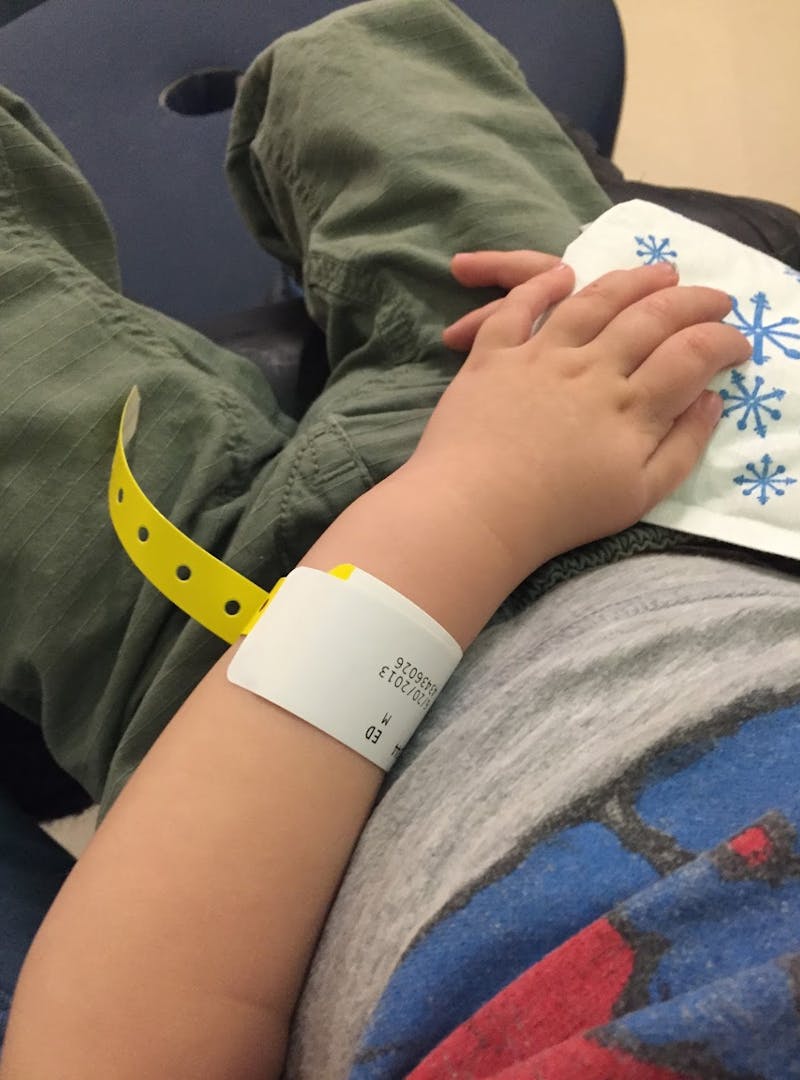 Abby Epperson's son sitting at urgent care.