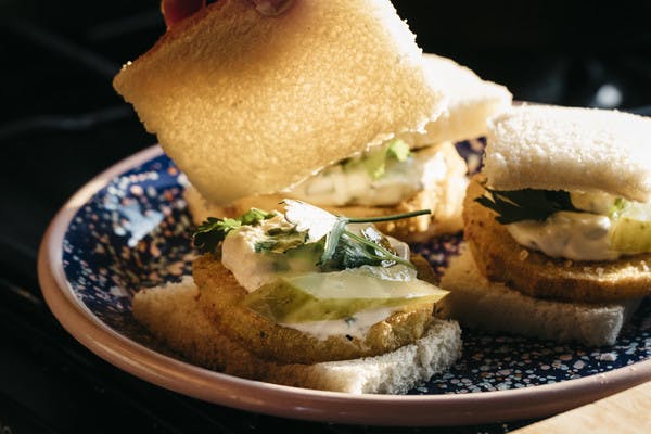 Plate of fried eggplant sliders.