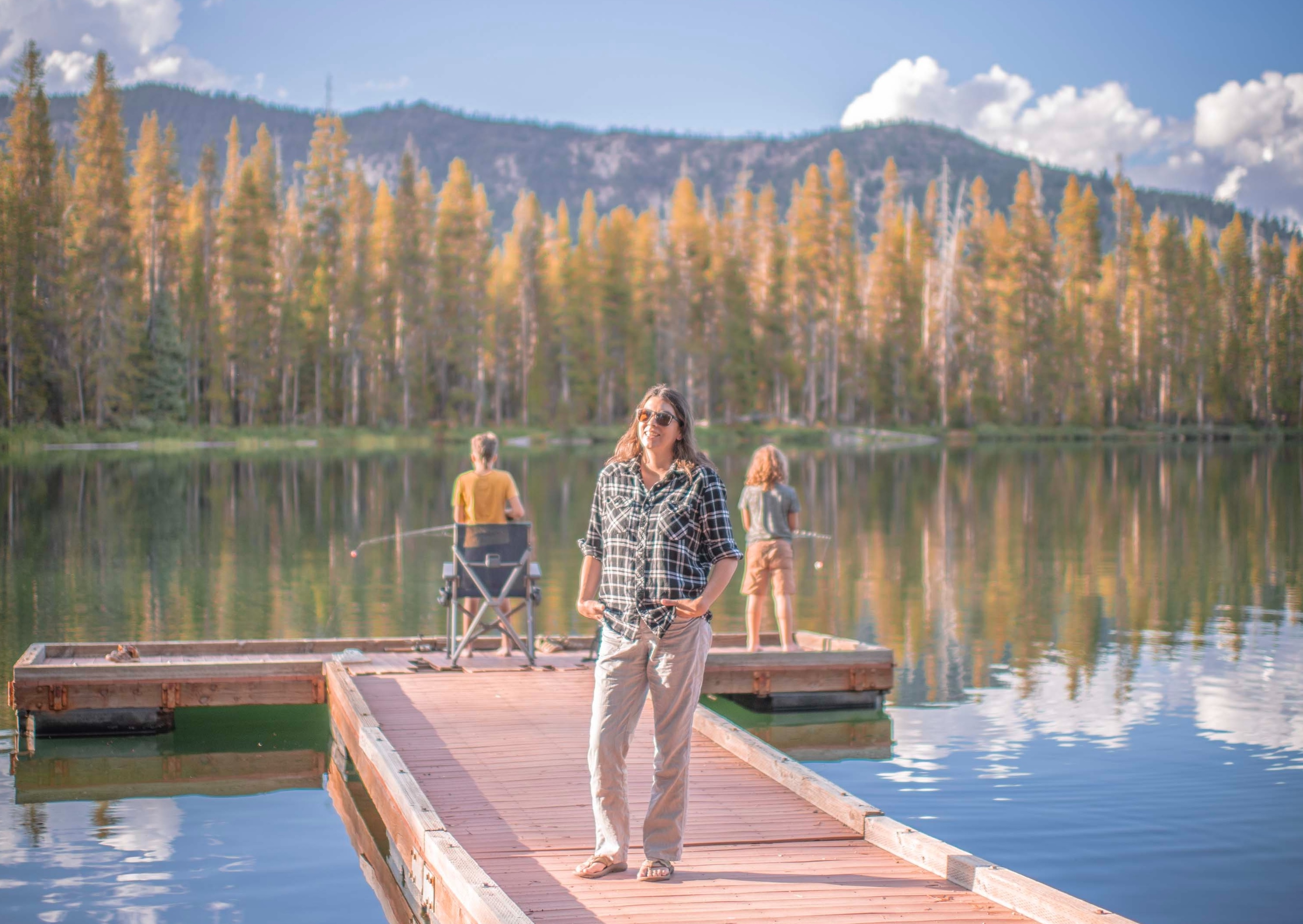 Chelsea Day and her kids fishing on a dock at Sawtooth National Forest