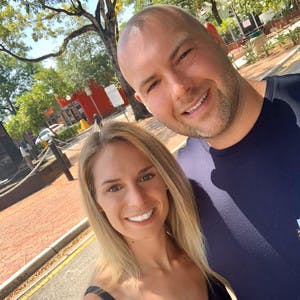 Max Perron and Marie-Michelle Roy smile for a close-up picture.