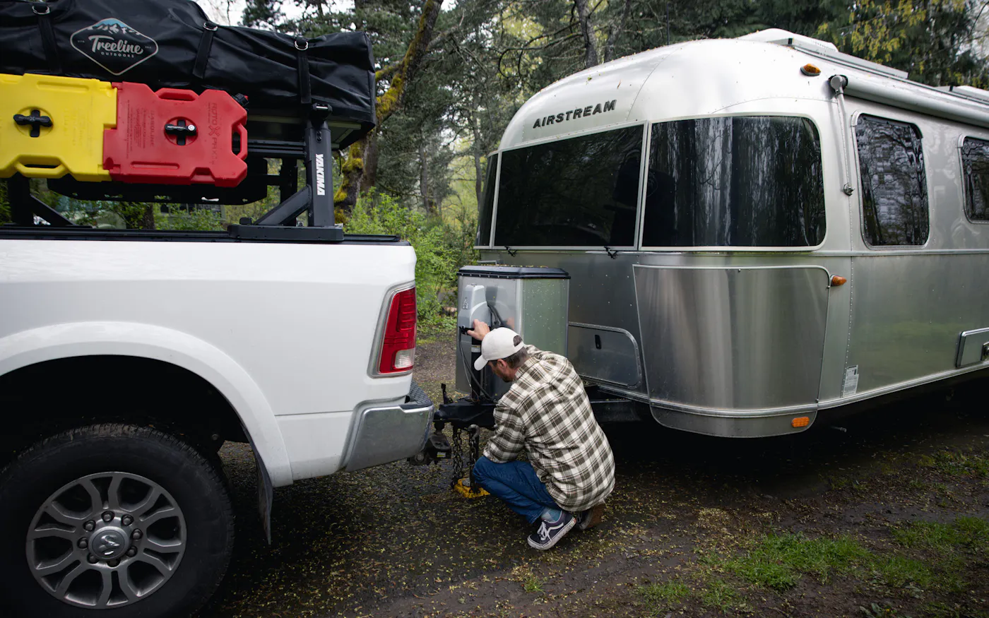 Karen Blue's husband unhitching their Airstream from their truck