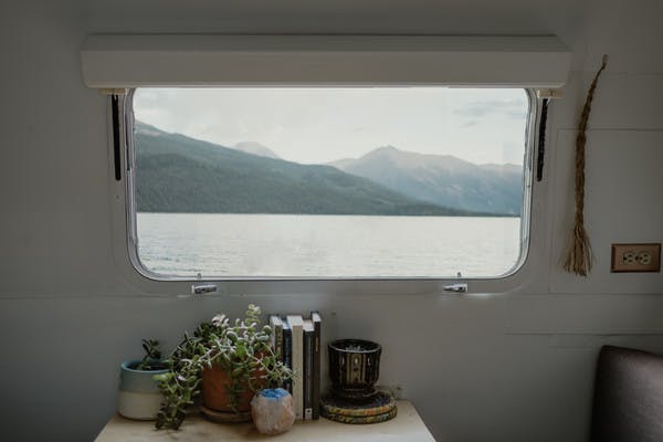 A view from the inside of an RV looking out the window to the Twin Lakes, in Colorado. 