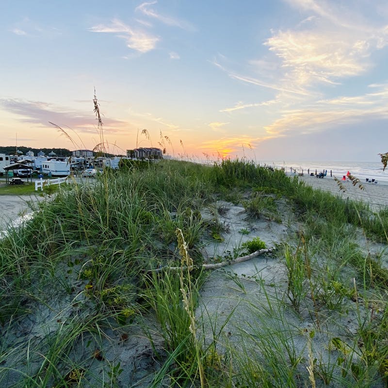 Eric Hannon's RV parked at the beach with other RVers.