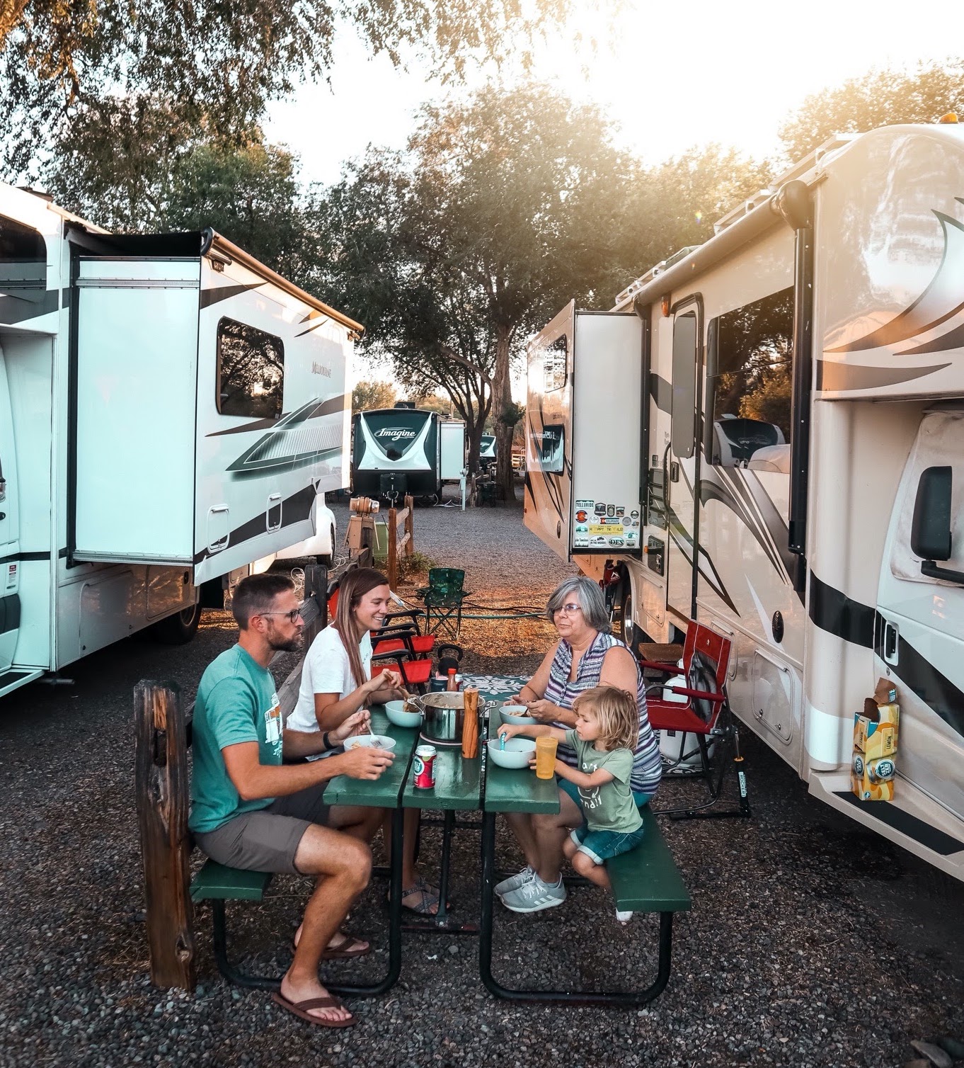 Holly Miner and her family at a picnic table at a campground.