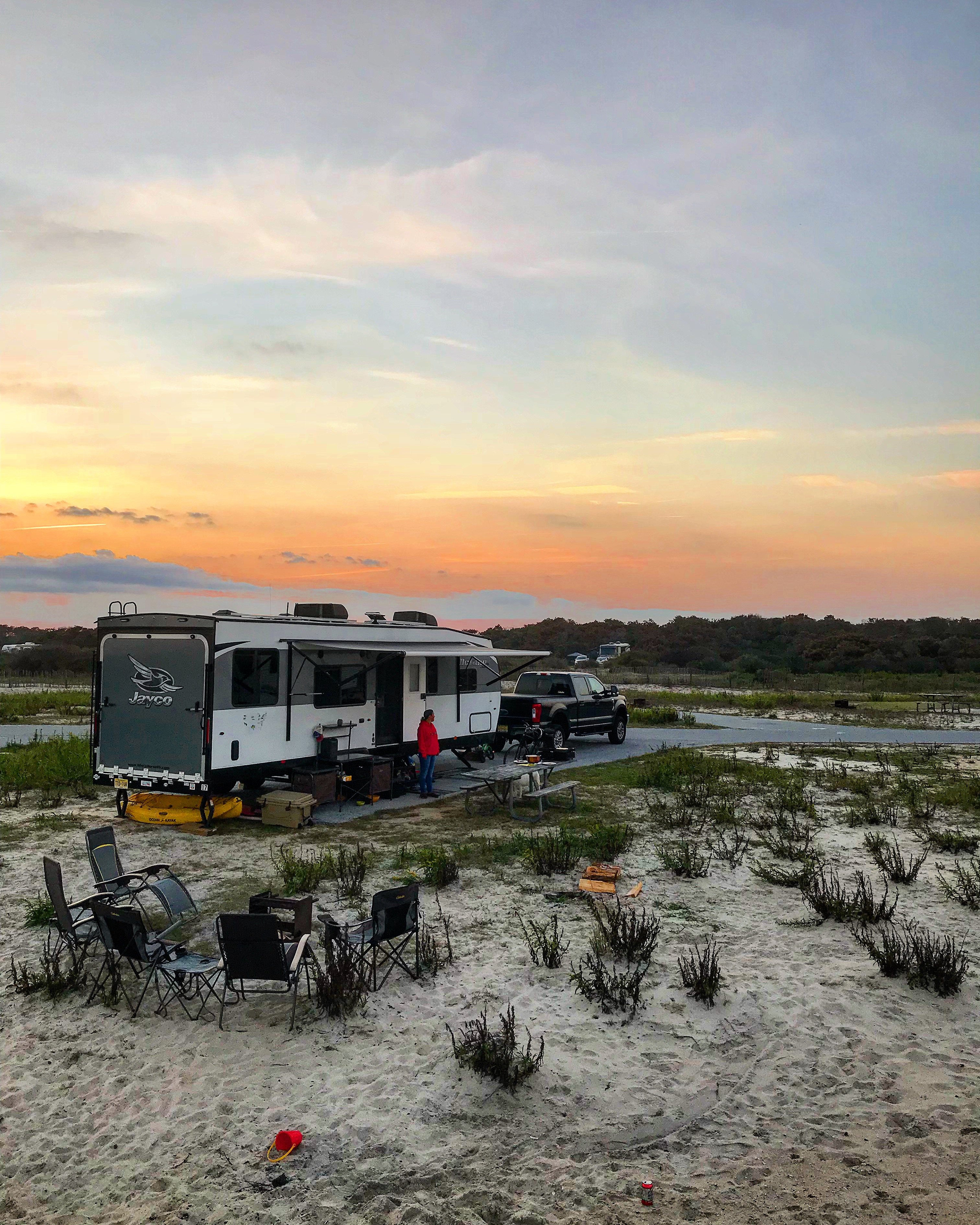A Toy Hauler RV parked in the desert. 
