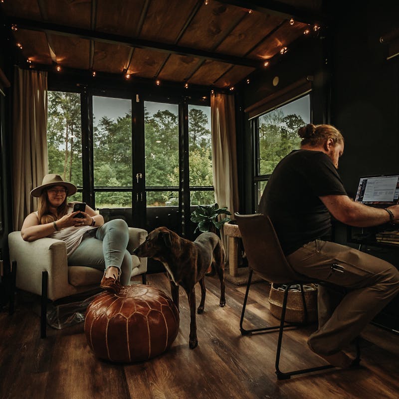 Kris & Andy Murphy hang out in the garage of their toy hauler