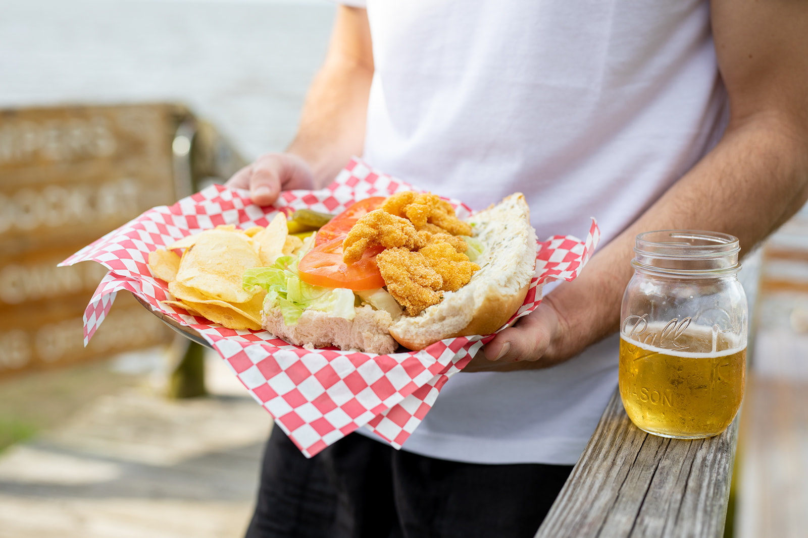 Crispy fried shrimp on a french roll with remoulade, tomatoes and lettuce.  